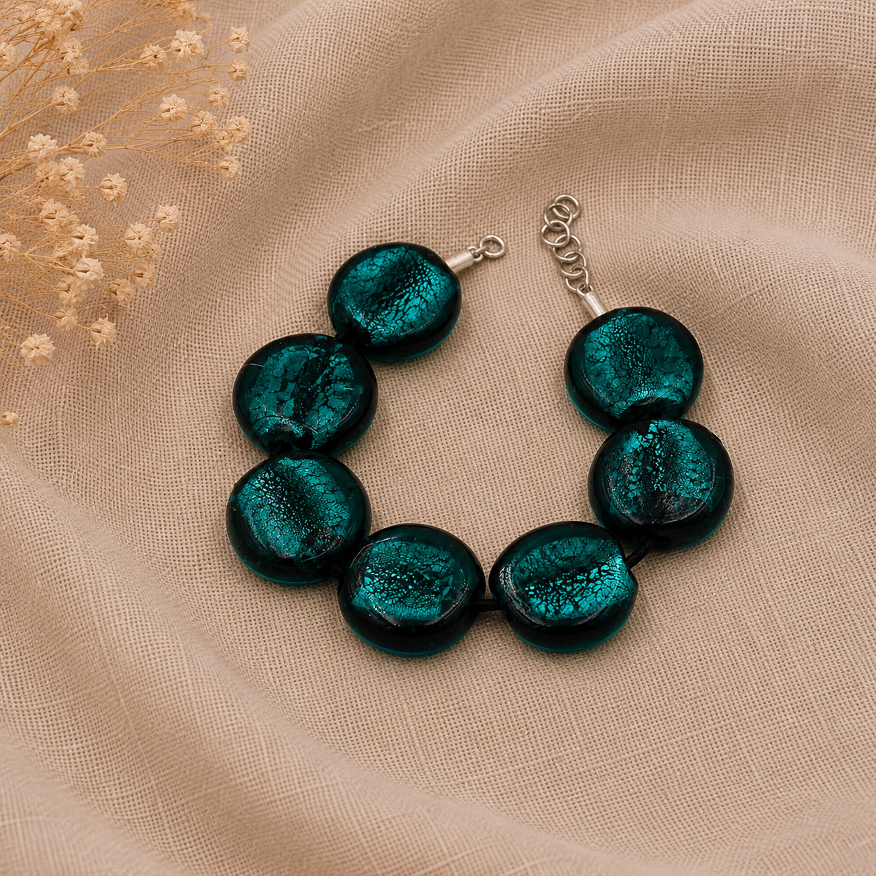 Pulsera Lagoon de vidrio de Murano artesanal y plata de ley inspirada en las aguas cristalinas y los tonos del mar.