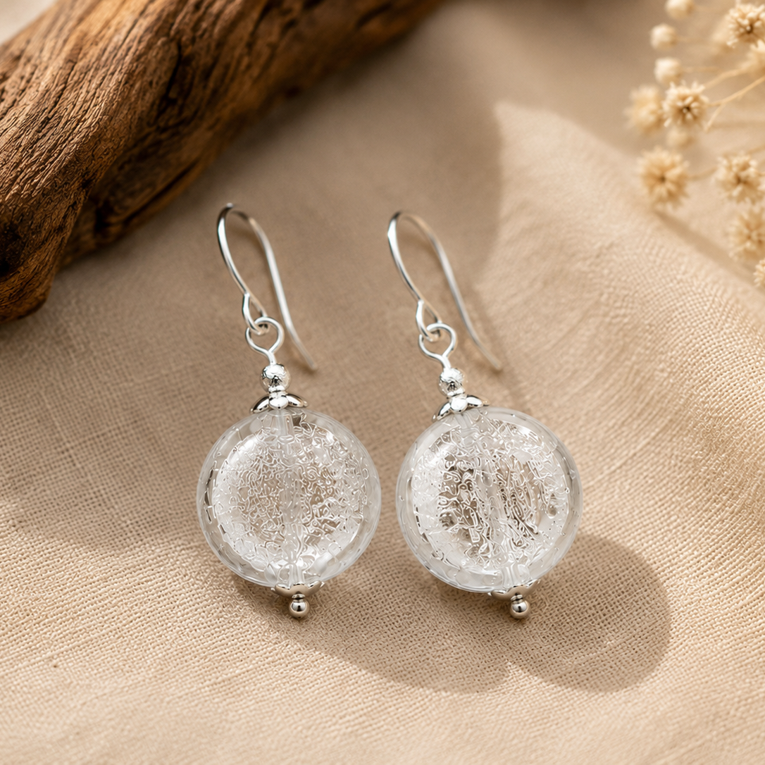 Pendientes Argento de vidrio de Murano artesanal y plata de ley con delicados reflejos plateados y gran luminosidad.