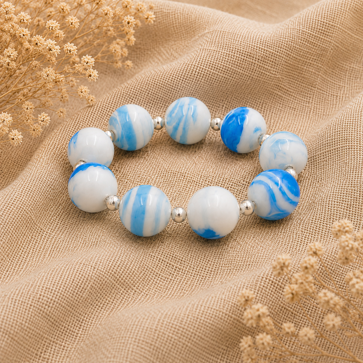 Pulsera Mar de vidrio de Murano artesanal y plata de ley inspirada en los colores y reflejos del océano.
