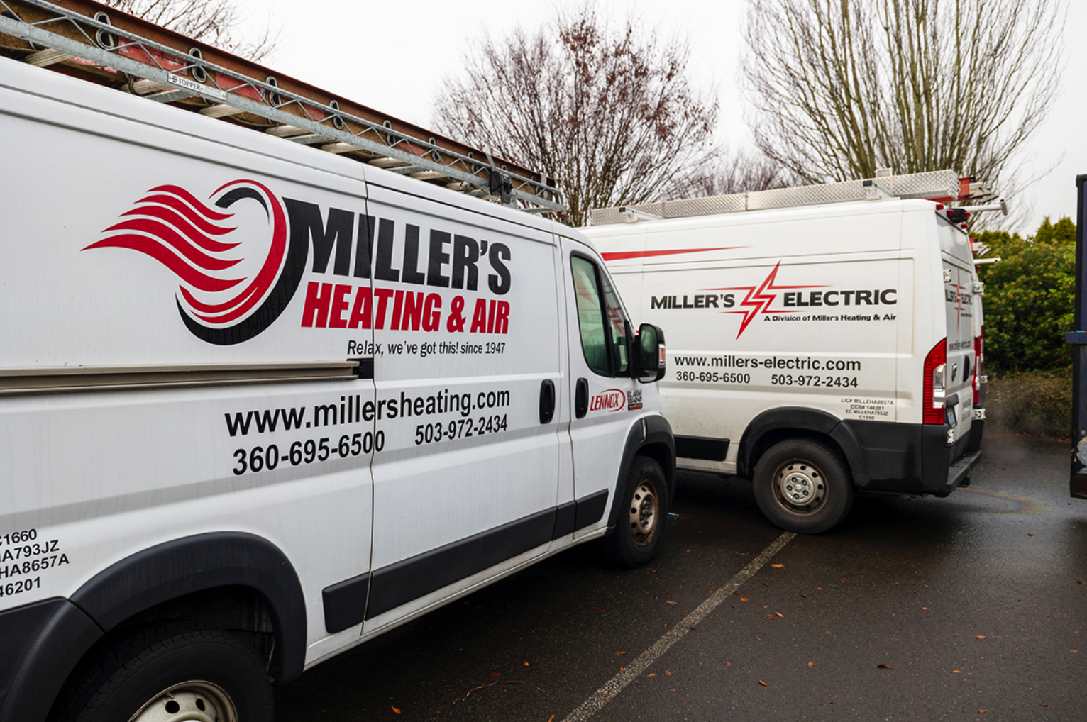 Millers Heating and Air Truck next to Miller's Electric Truck