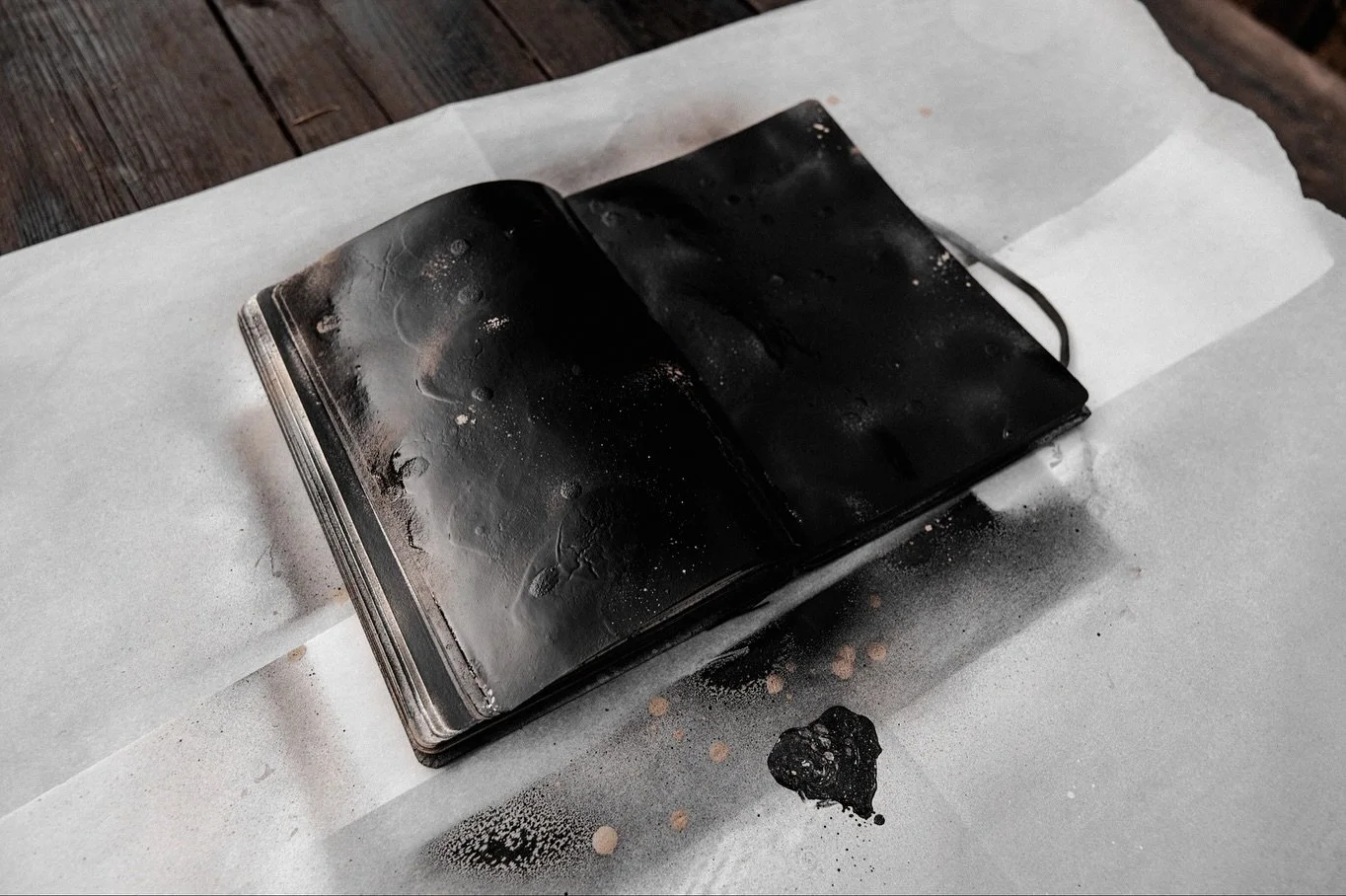 &Uacute;TERO DE LUZ &mdash; BOOK OF BLACK HOLES. Layers of spray and pastel on paper.