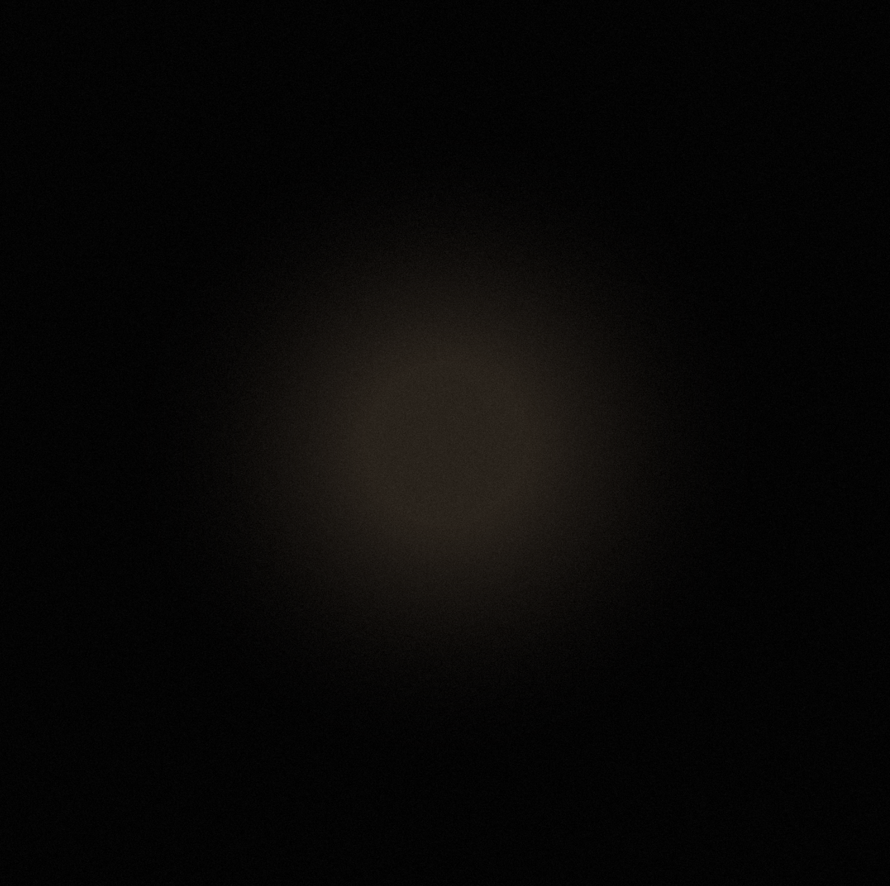 Very dark image with a faint glow in the center