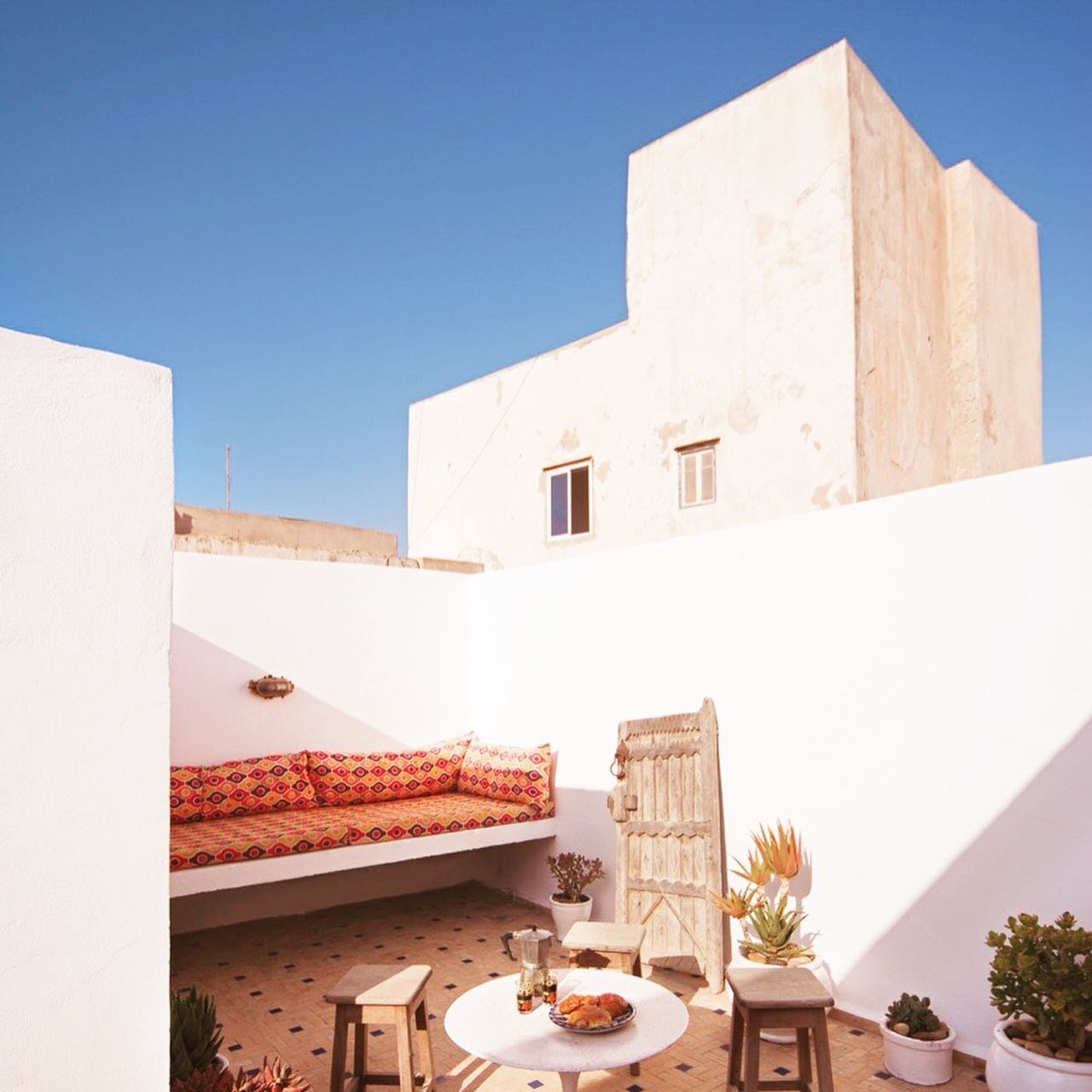 Discover more and book your next escape via @boutiquehomes 🏄🏽&zwj;♀️🌴🐪 #REPOST Lovely, laidback Essaouira enchants with its labyrinthe streets, earthen ramparts, and wild, windy coastline that&rsquo;s made it a Mecca for surfers. Stay at Nomad Ho