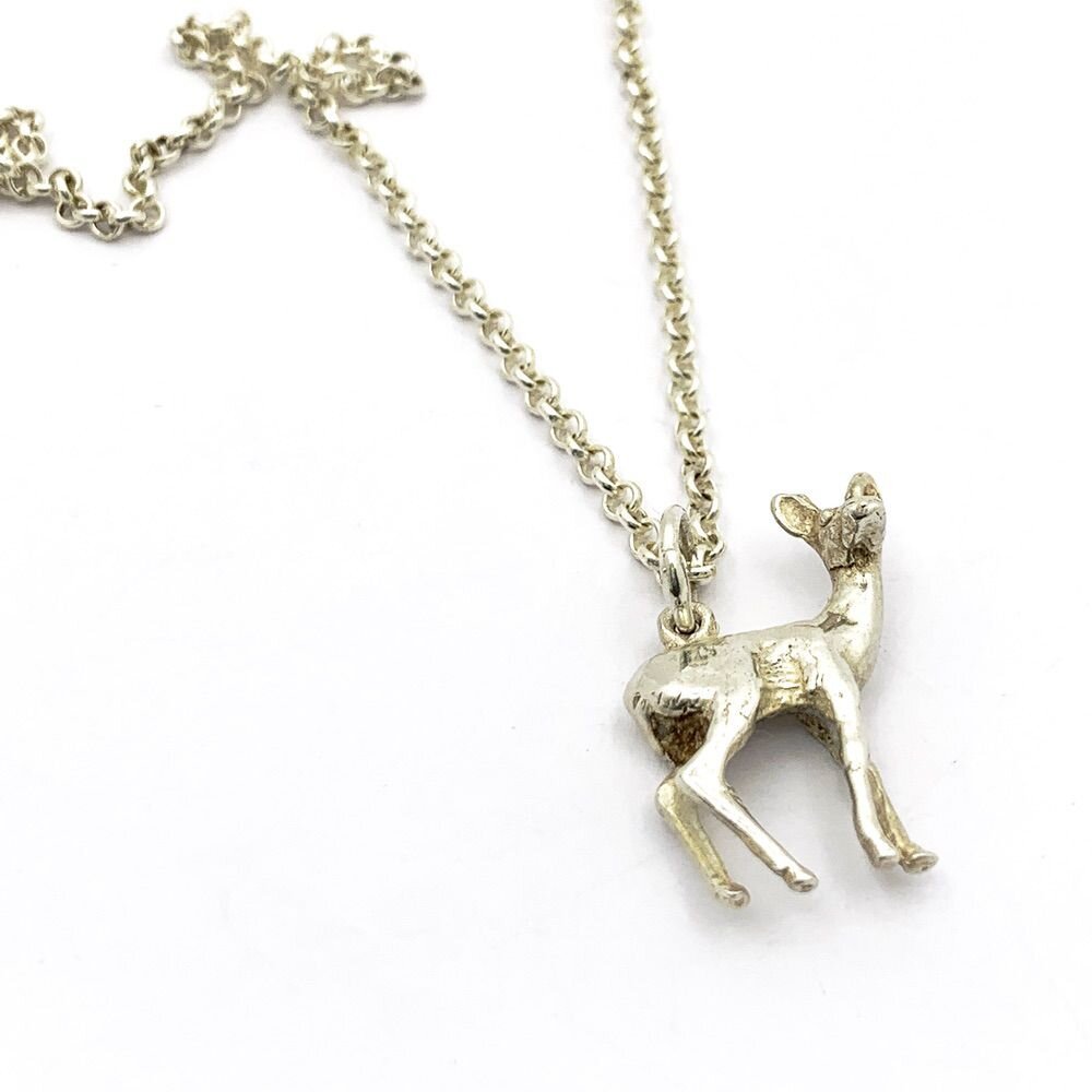 LOT 2 CHANEL CLOVER & BAMBI DEER CHARM PENDANTS + SILVER NECKLACE