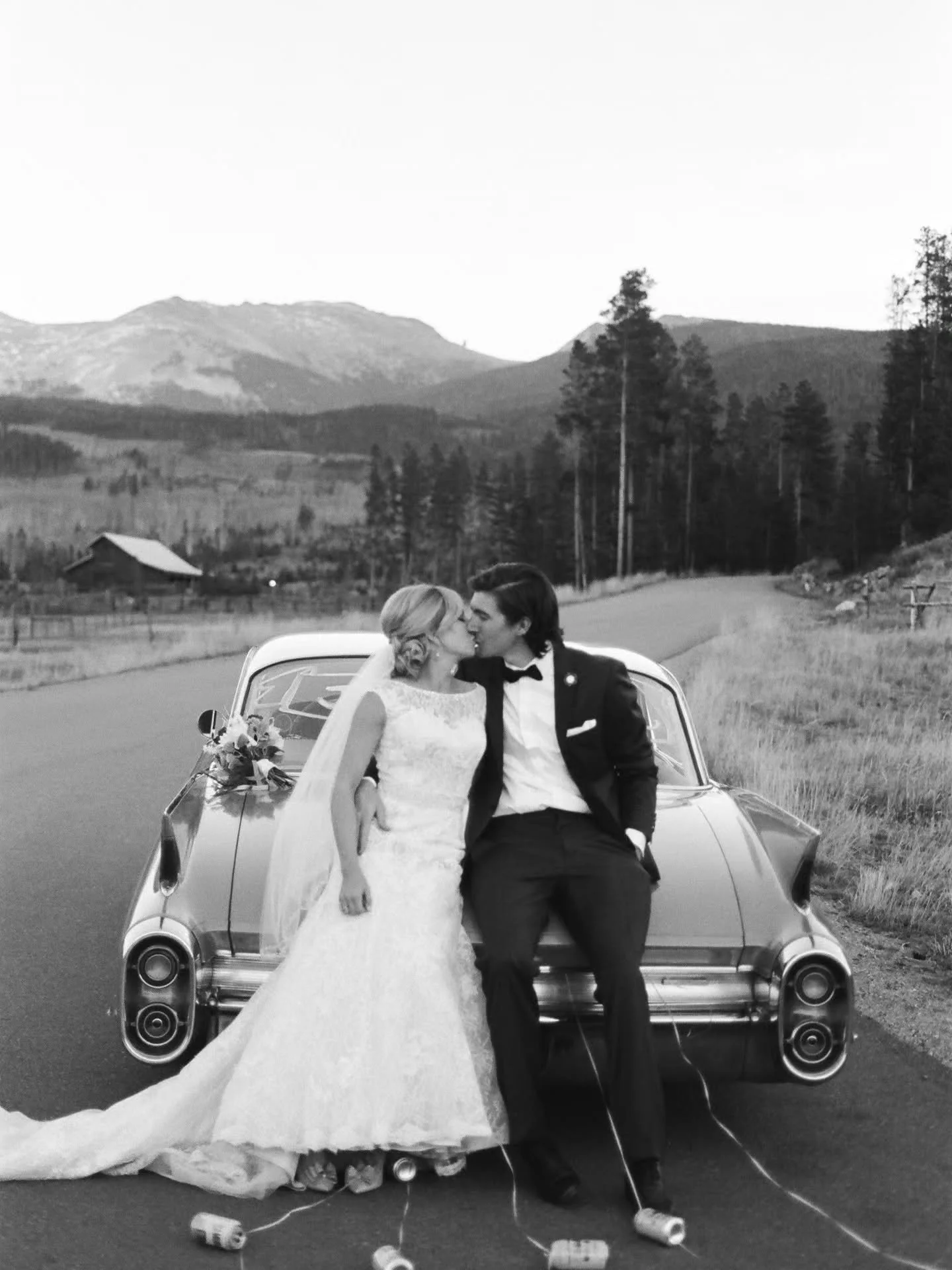 Happy Anniversary to these two! @kristinhildebrand_kp @jrhildebrand. @devilsthumbranchweddings #Colorado Shot on Fuji Color Film and @kodak #blackandwhite.  JR had his beautiful 1960 #Cadillac at his wedding which made for such an incredible addition
