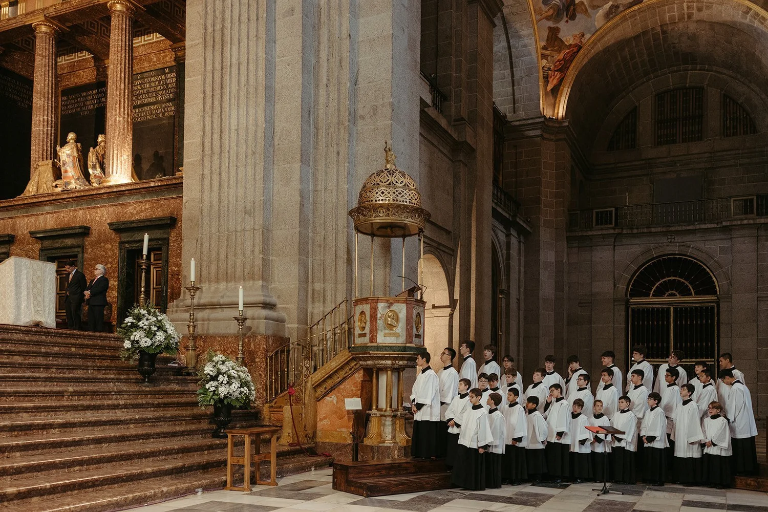Choir boys singing during a wedding ceremony in the Basilica of the Royal Monastery of El Escorial, Madrid