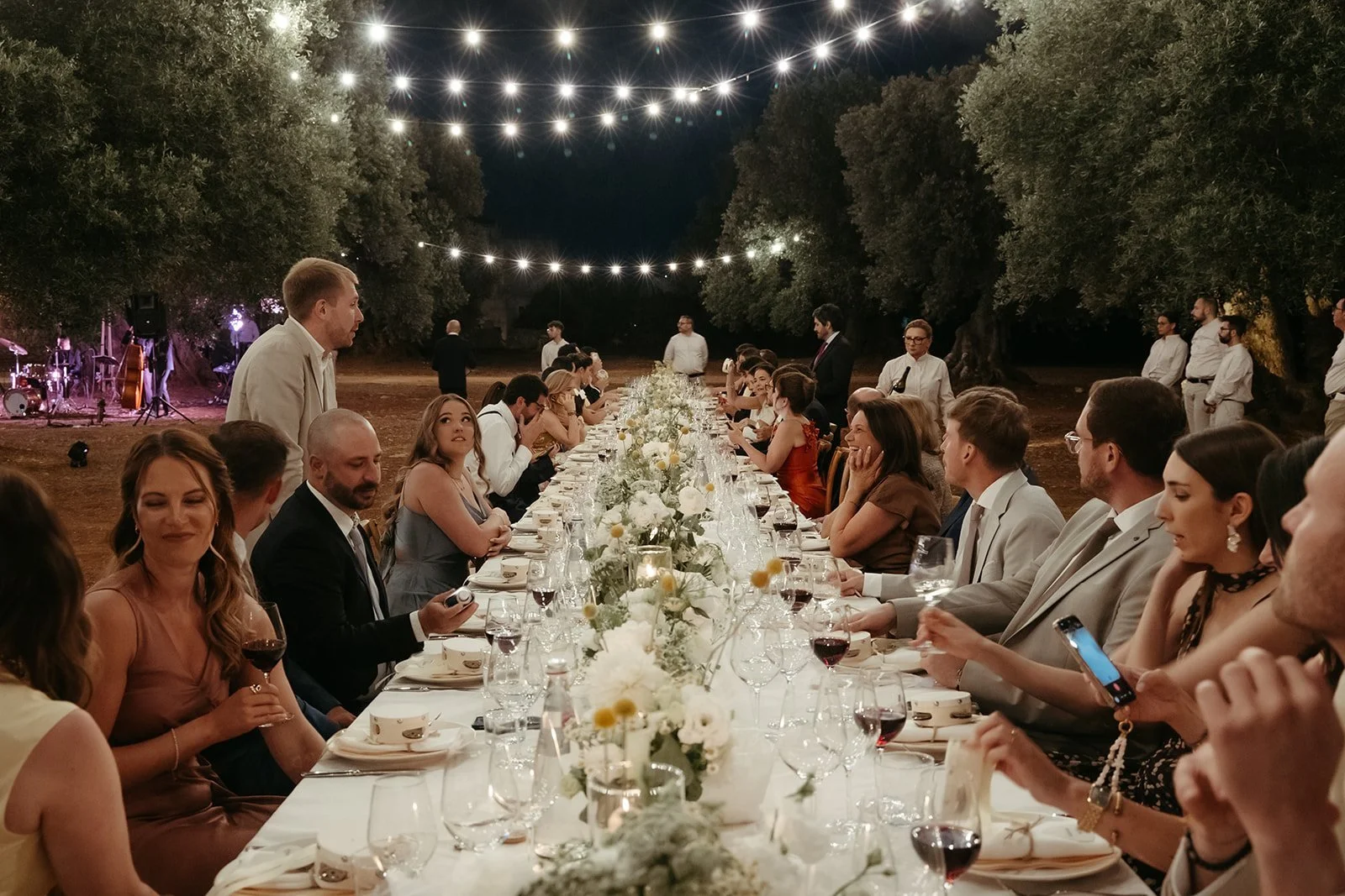 Dinner under string lights in the masseria’s olive grove