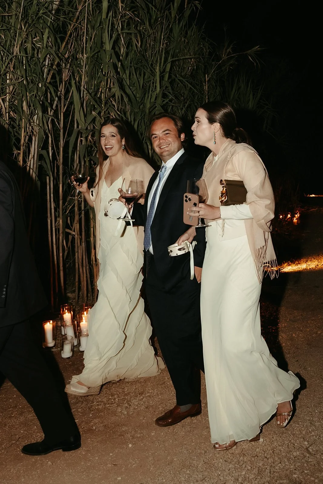The bride and groom dancing at night at the masseria