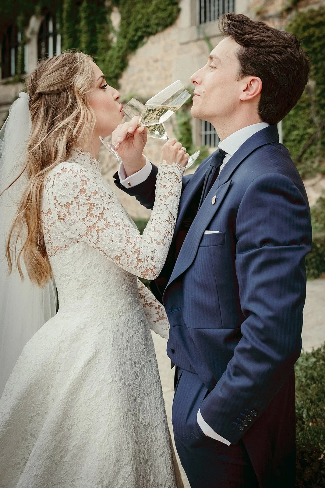 The bride and groom toasting with champagne at Finca El Campillo
