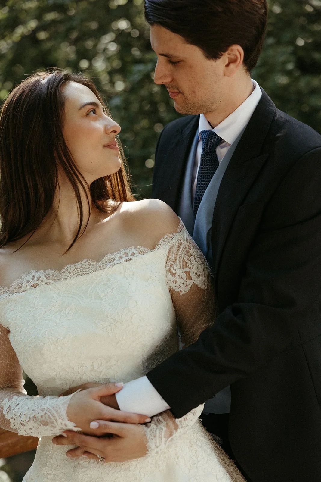 Portrait of the couple among the trees during their post-wedding session