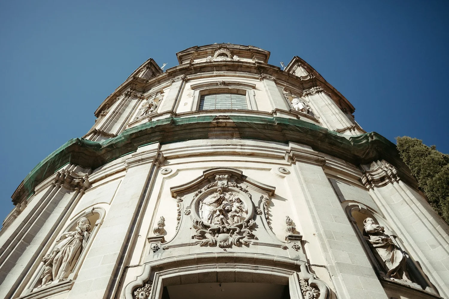 Baroque facade of the Basilica of San Miguel in Madrid on a wedding day