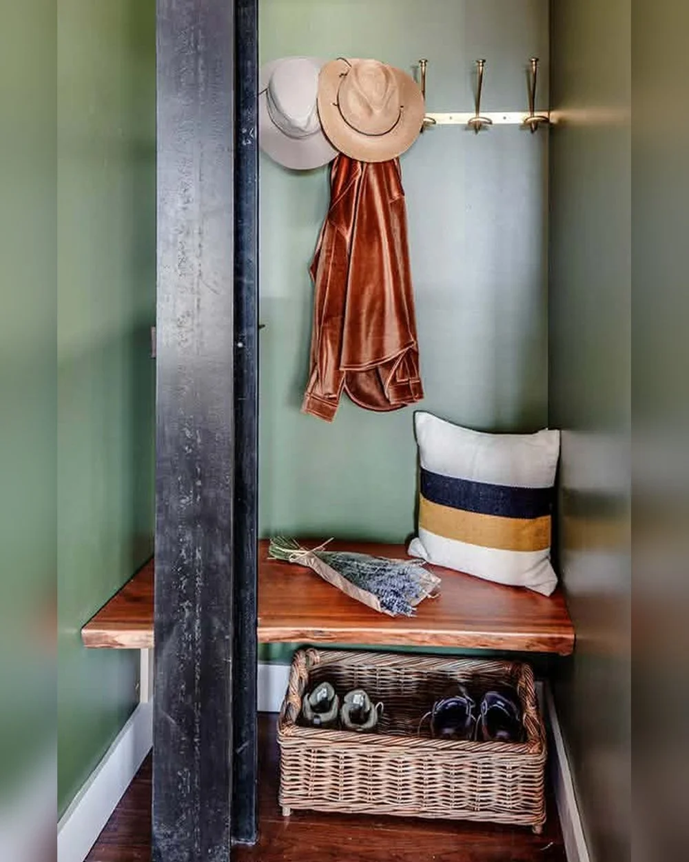 Sometimes the best spaces start as the most awkward ones.

This little corner used to be completely unusable. Now it&rsquo;s a hardworking drop zone with a live edge floating bench, brass hooks, and a little moment of color.

Design isn&rsquo;t just 