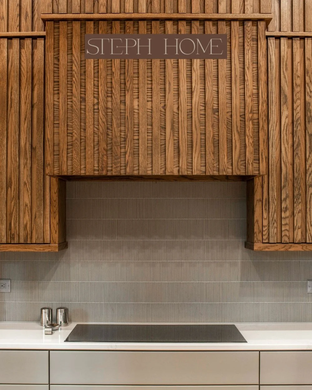 A project feature that proves warm minimalism doesn&rsquo;t have to feel cold.

Rich cabinetry, quiet texture, clean lines, and just enough contrast to let the materials speak for themselves. The reeded wood detail brings movement and depth, while th