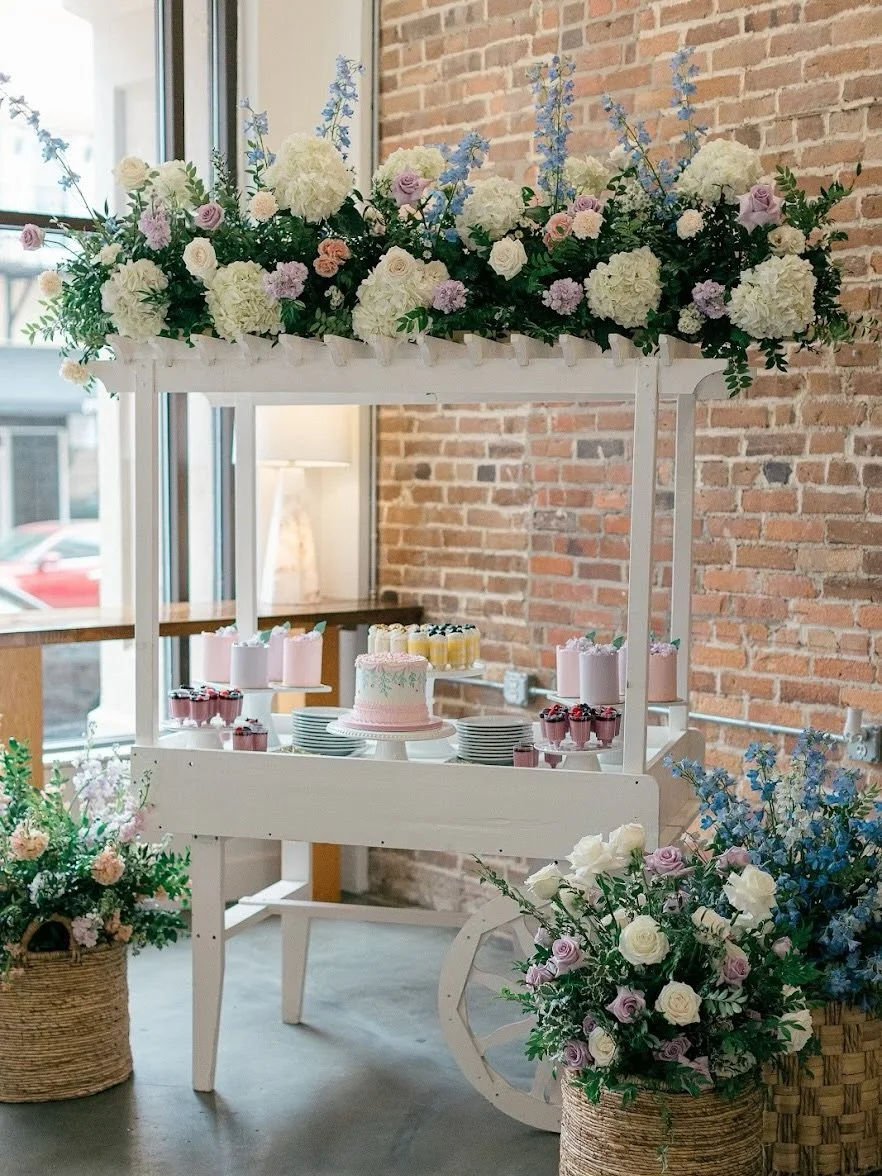 Who says wedding dessert has to be cake?

From a dessert cart filled with a variety of treats to cotton candy stations, nostalgic ice cream sandwiches, and donut walls, interactive desserts are stealing the spotlight! Not only are they fun for your g