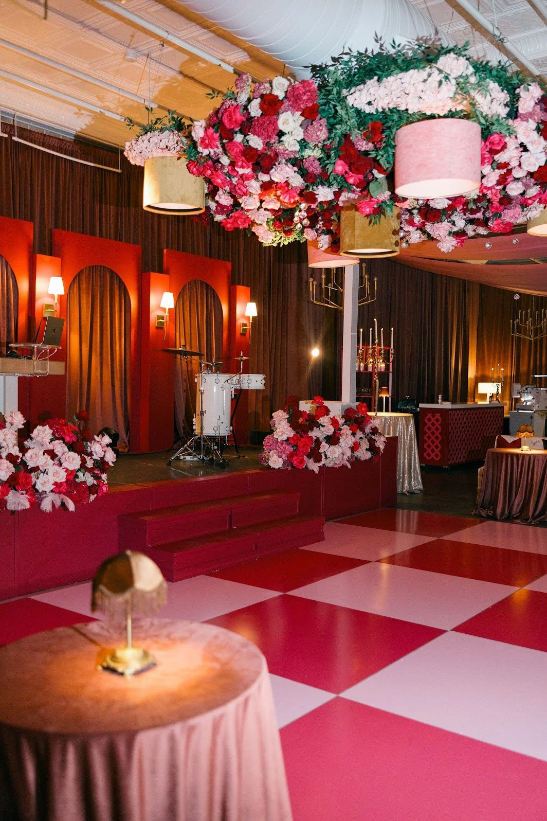 Party venue with burgundy checkered dance floor