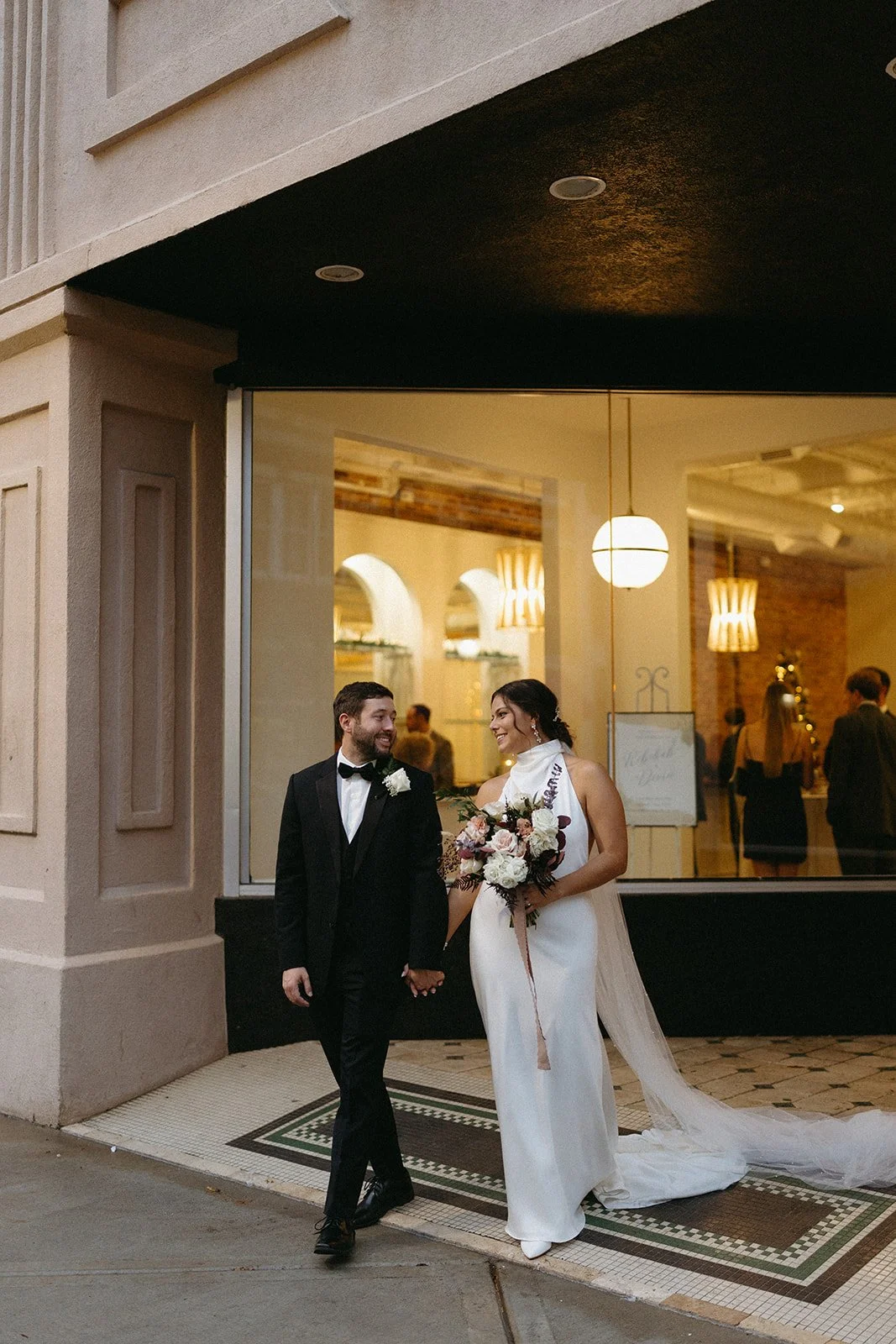 Newlyweds in front of The Elia micro wedding venue in NC