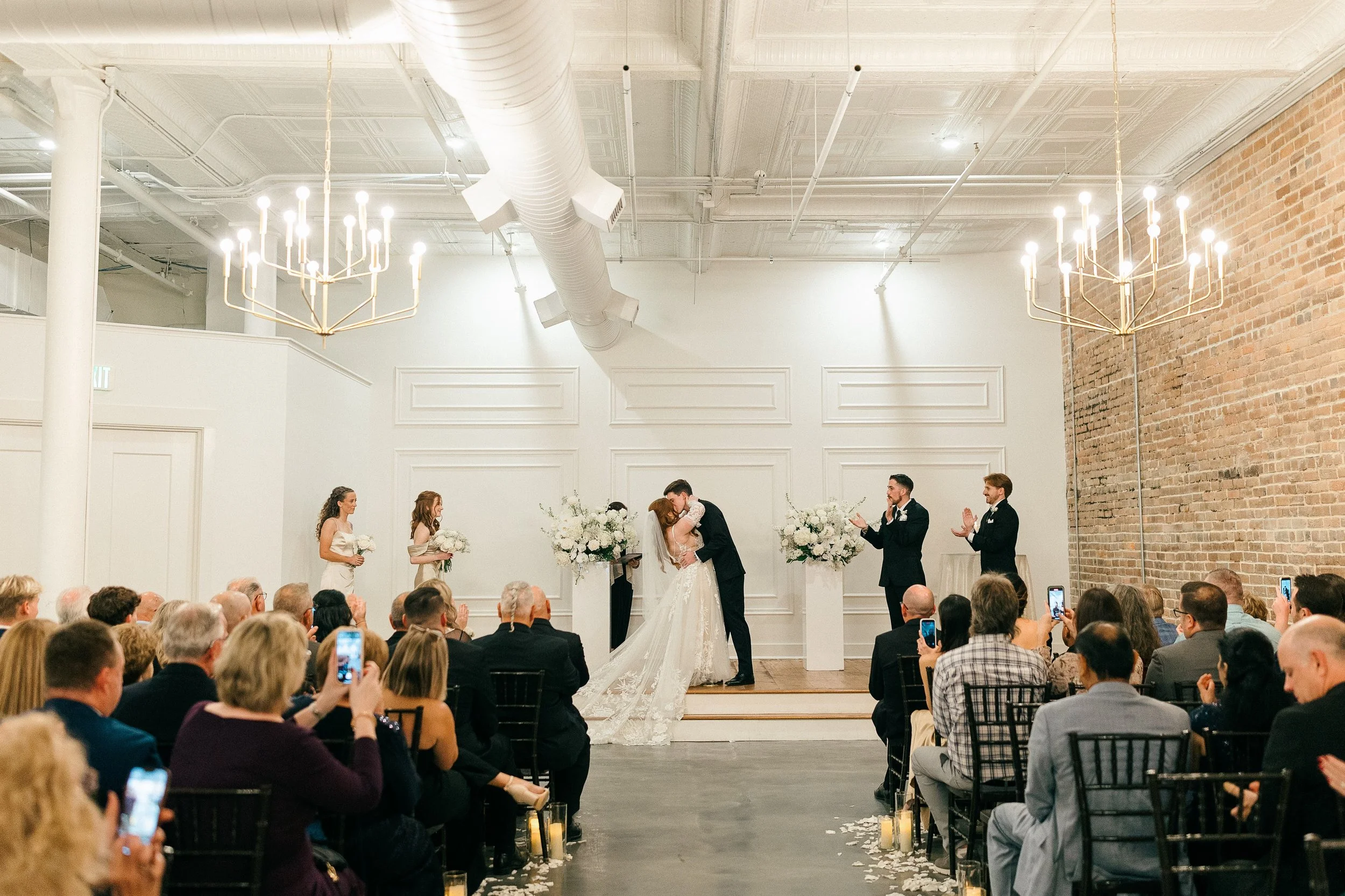 Bride and groom kiss during NC micro wedding ceremony