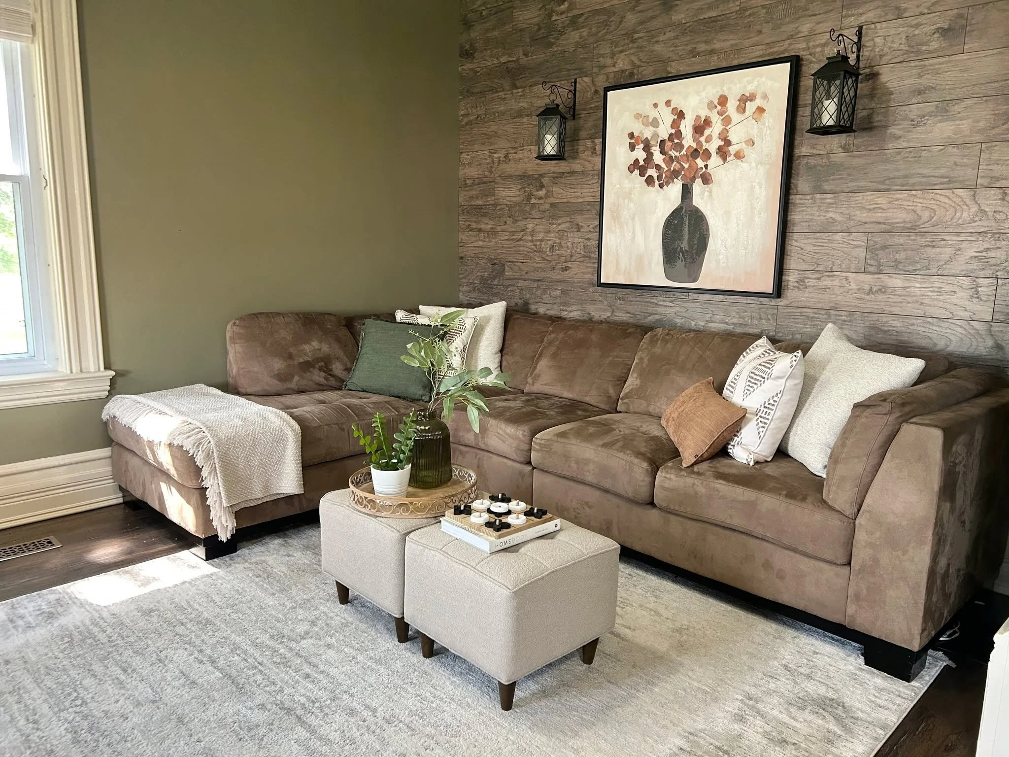 Imagine waking up in a space that sparks joy! In this beautifully staged home, we balanced layering and proportion to create a sense of serenity. New artwork, a neutral rug, and a coffee table brought it all together. And the result? This stunning ho