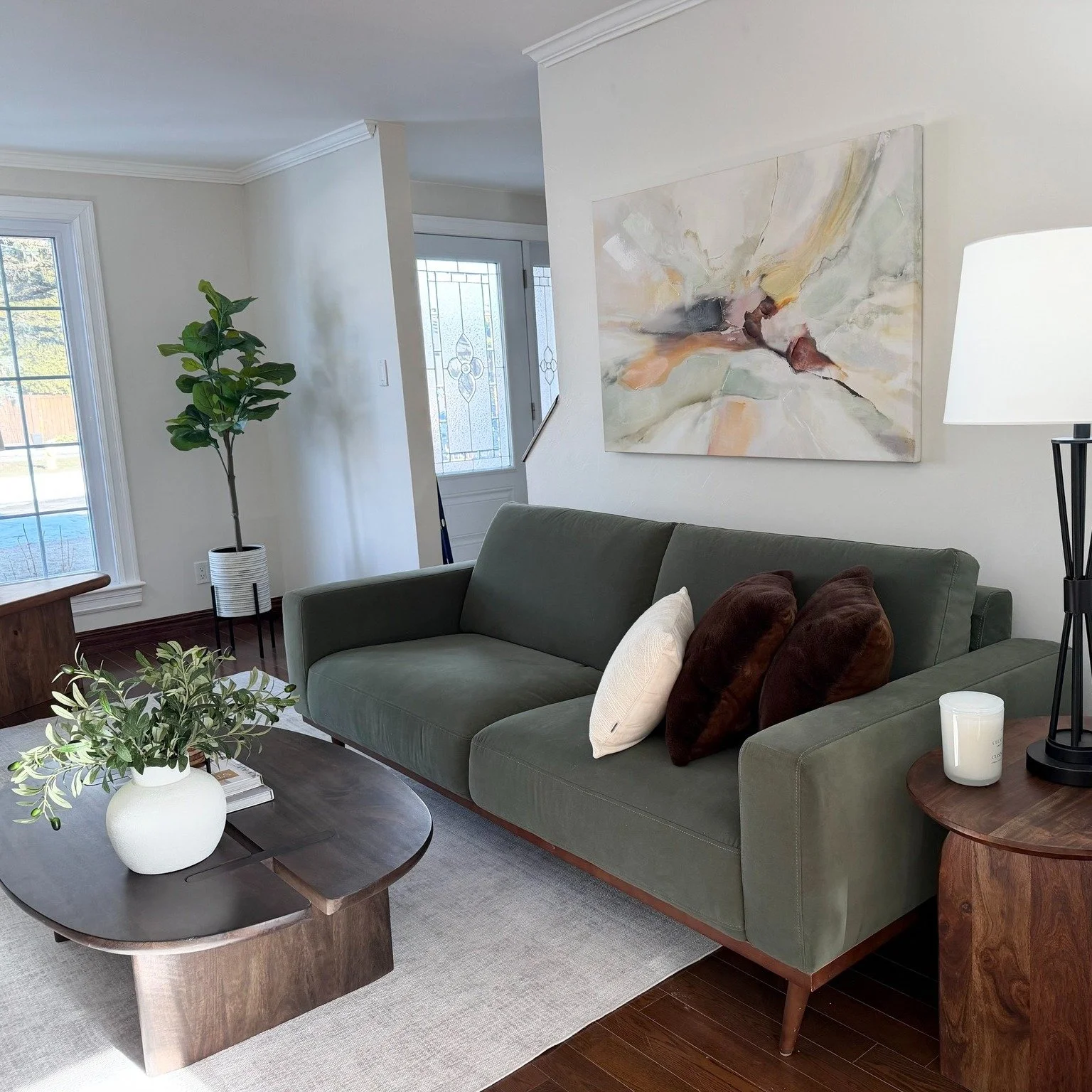 Imagine a space that reflects the essence of Mid Century comfort, perfectly in tune with the vintage charm of the property! We transformed this previously unused room into a warm and inviting space, replacing every piece of furniture, artwork, and la