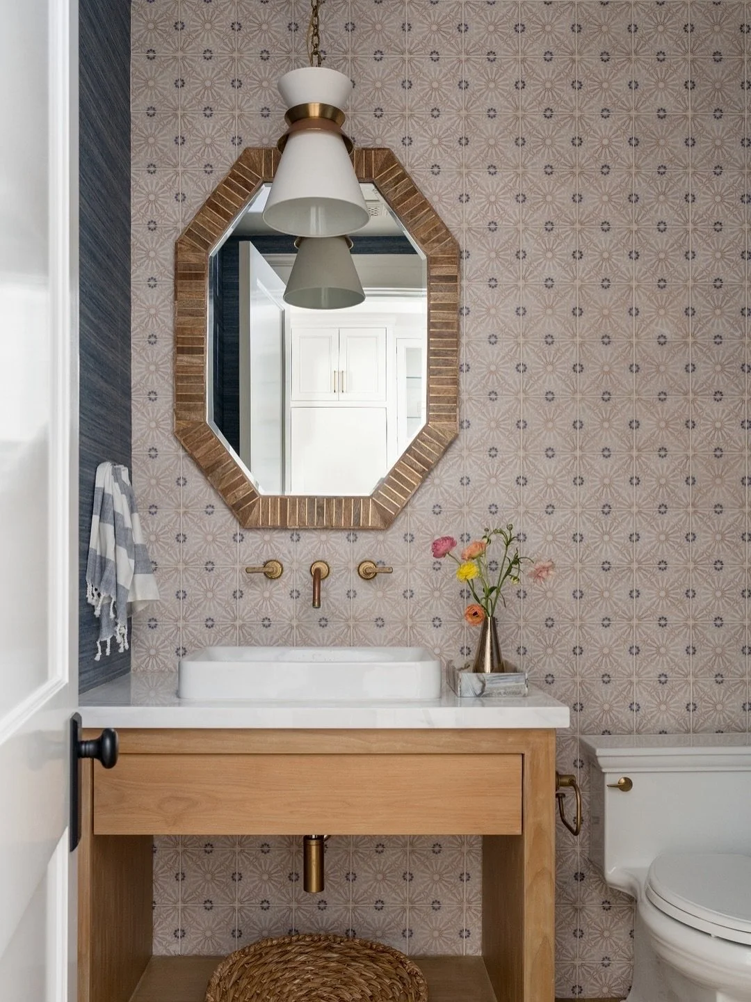 Light, texture, and a touch of pattern &mdash; proof that even the smallest spaces can make a statement.