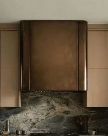 The finished detail gets the spotlight, but the process is the story.

Concept &amp; Drawings &rarr; Renderings &rarr; Materials &amp; Finishes &rarr; Site Checks &rarr; Fabrication &rarr; Install

This custom hood took thoughtful planning, collabora