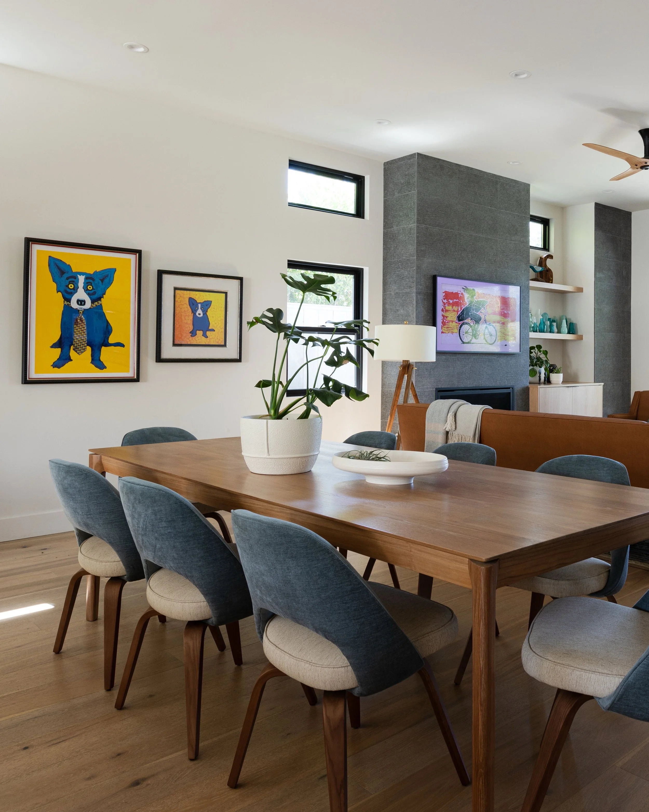 A study in layers.

Collected art, warm wood tones, sculptural forms, and sightlines that connect every corner of the home. Swipe through a Scandinavian-inspired new build filled with mid-century style pieces, vintage finds, a sculptural art installa