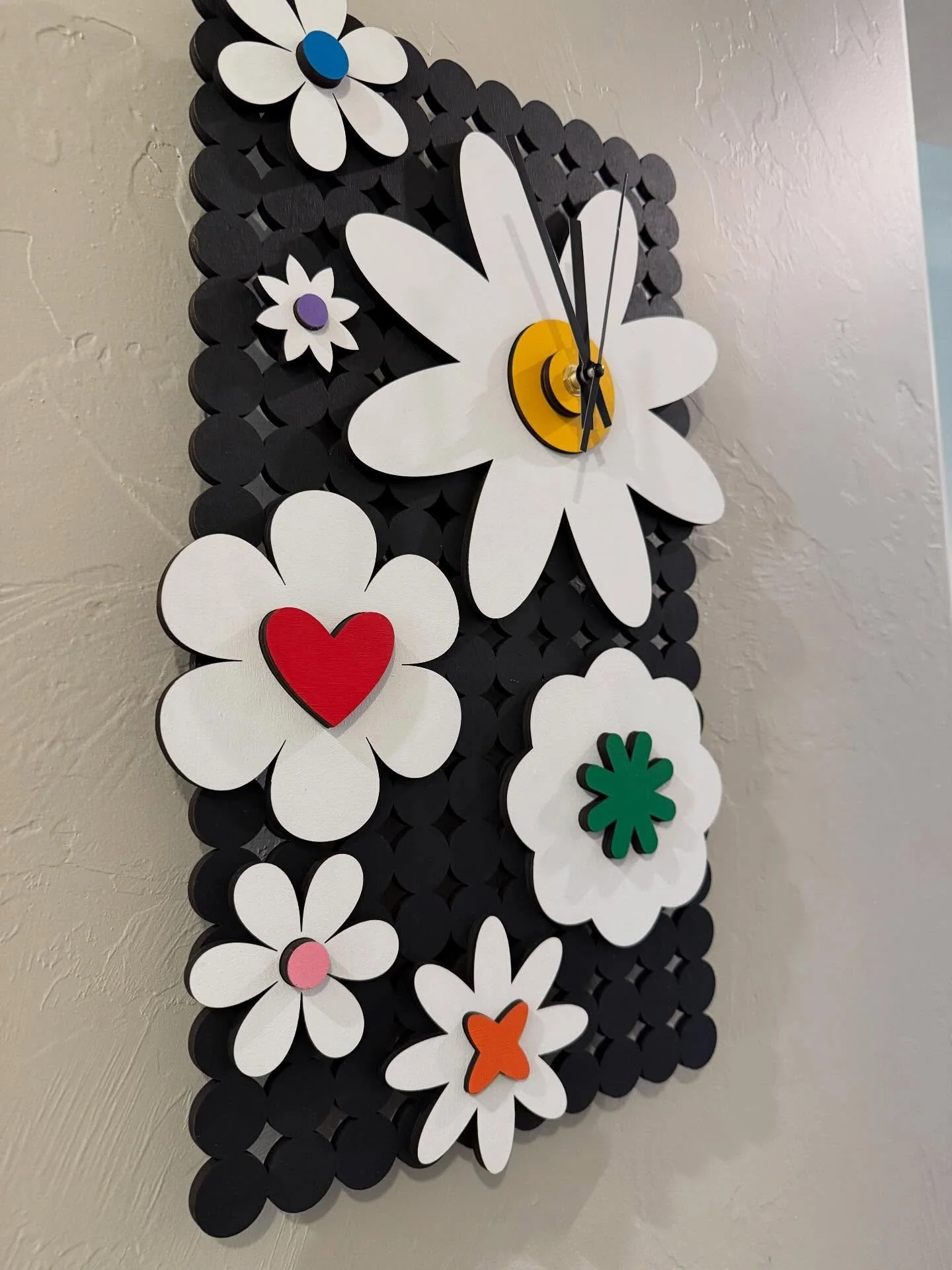2 cute new clocks available at @dnagalleries. I love that you can see your walk through the black grid.