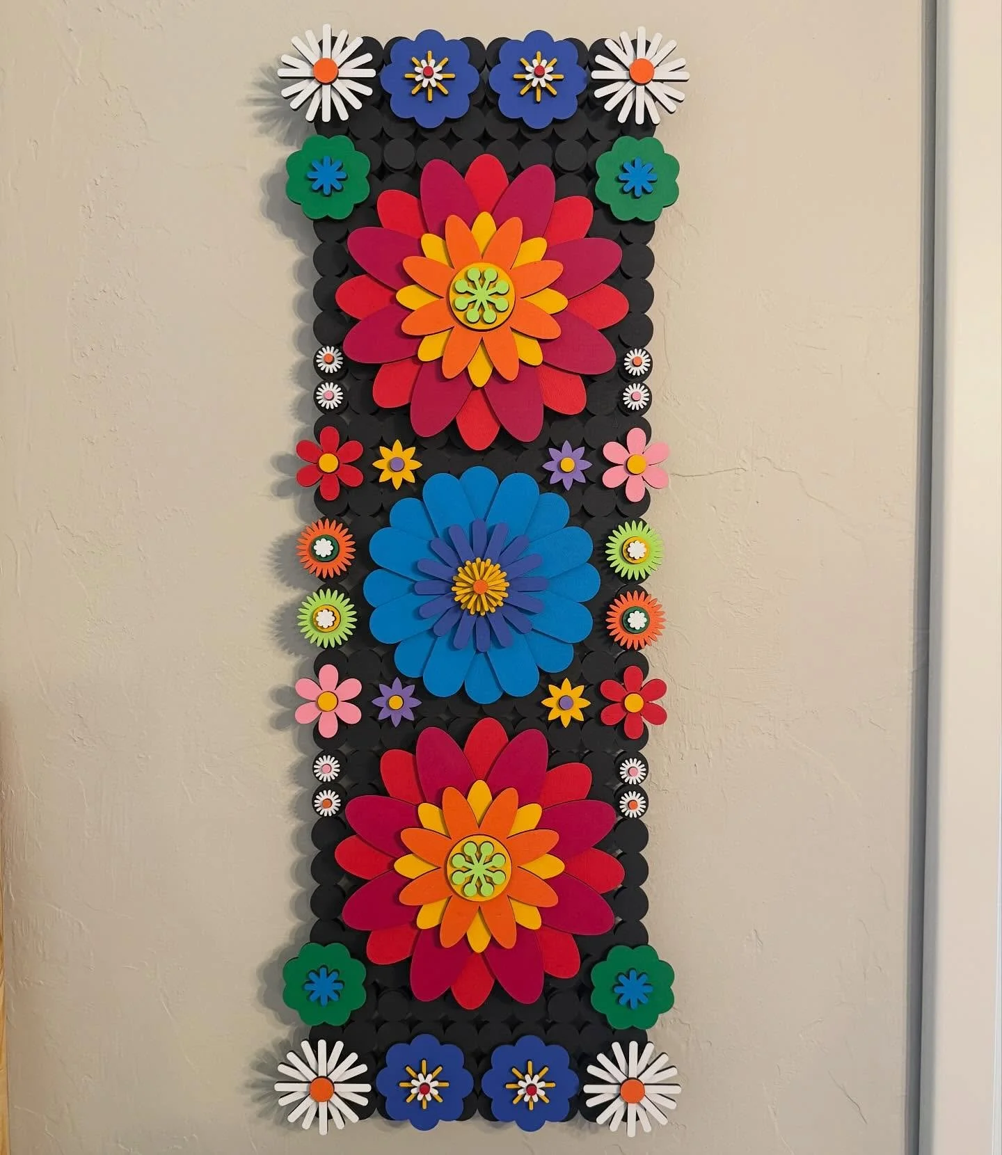 This lady has been sitting cut for a while and I&rsquo;ve been very slowly working on it. Finally complete.  Approx. 30&rdquo; tall. This Floral Kaleidoscope is the biggest I&rsquo;ve done. I had to seam pieces of wood together to get the large grid.