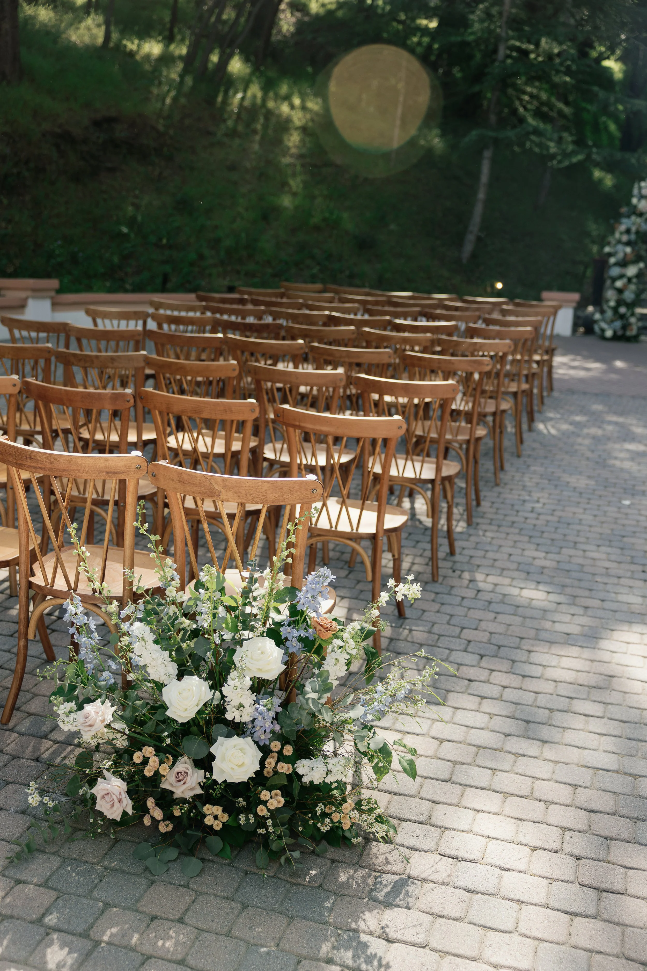 Rancho-Las-Lomas-wedding-ceremony-ground-florals.jpg