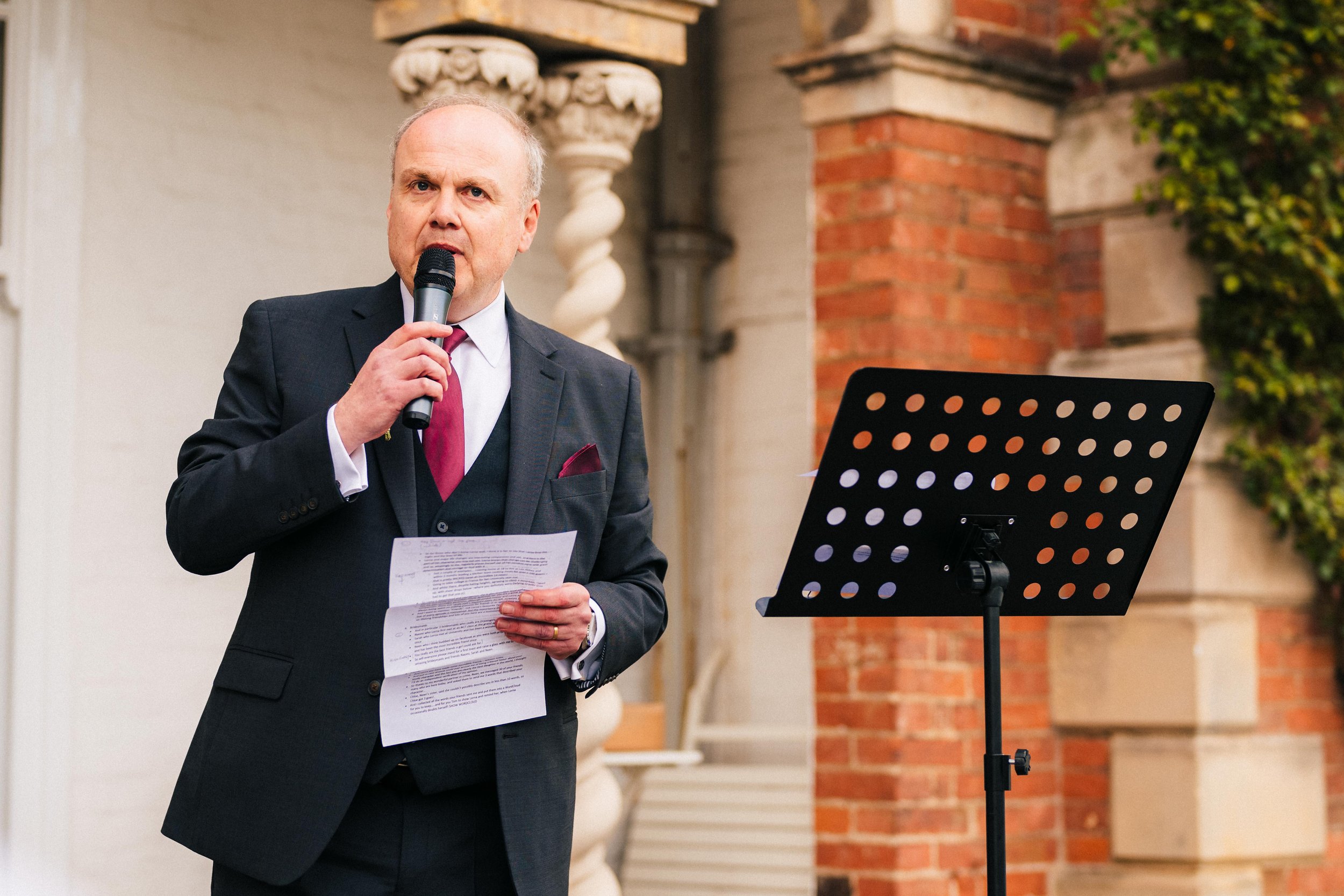 SUTTON BONINGTON HALL WEDDING PHOTOGRAPHY - father of the bride gives his wedding speech in the gardens