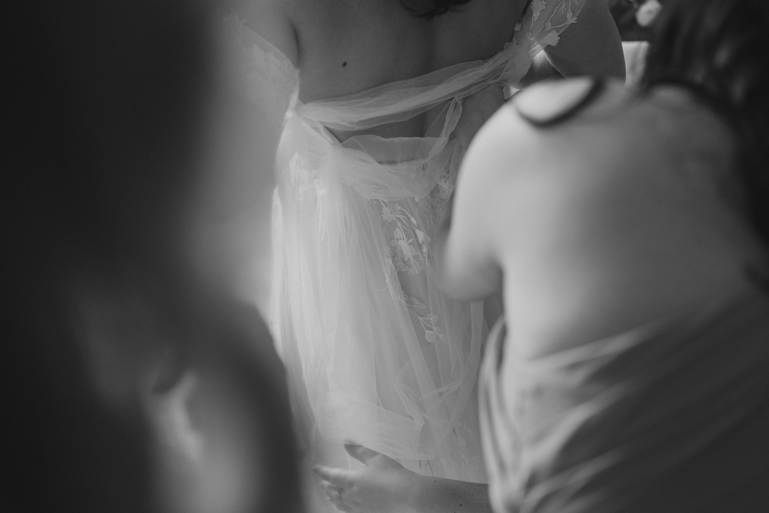 HODSOCK PRIORY WEDDING PHOTOGRAPHY - the detail of the brides dress