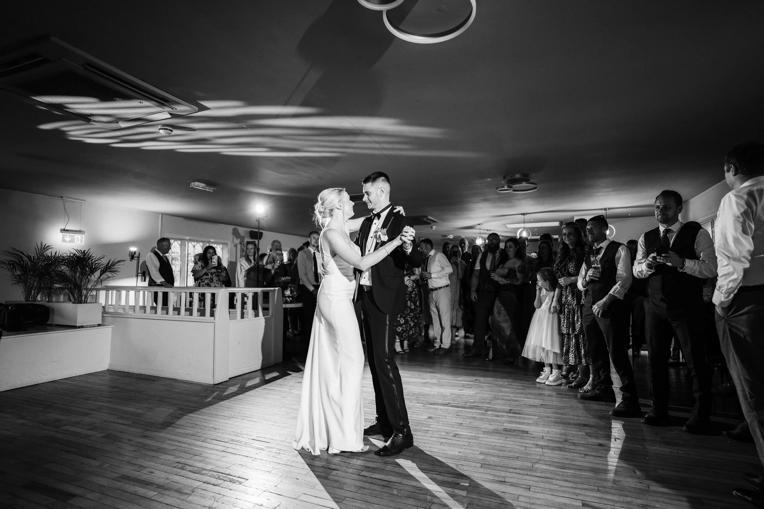 WOODBOROUGH HALL WEDDING PHOTOGRAPHER -bride and groom dancing during their wedding first dance