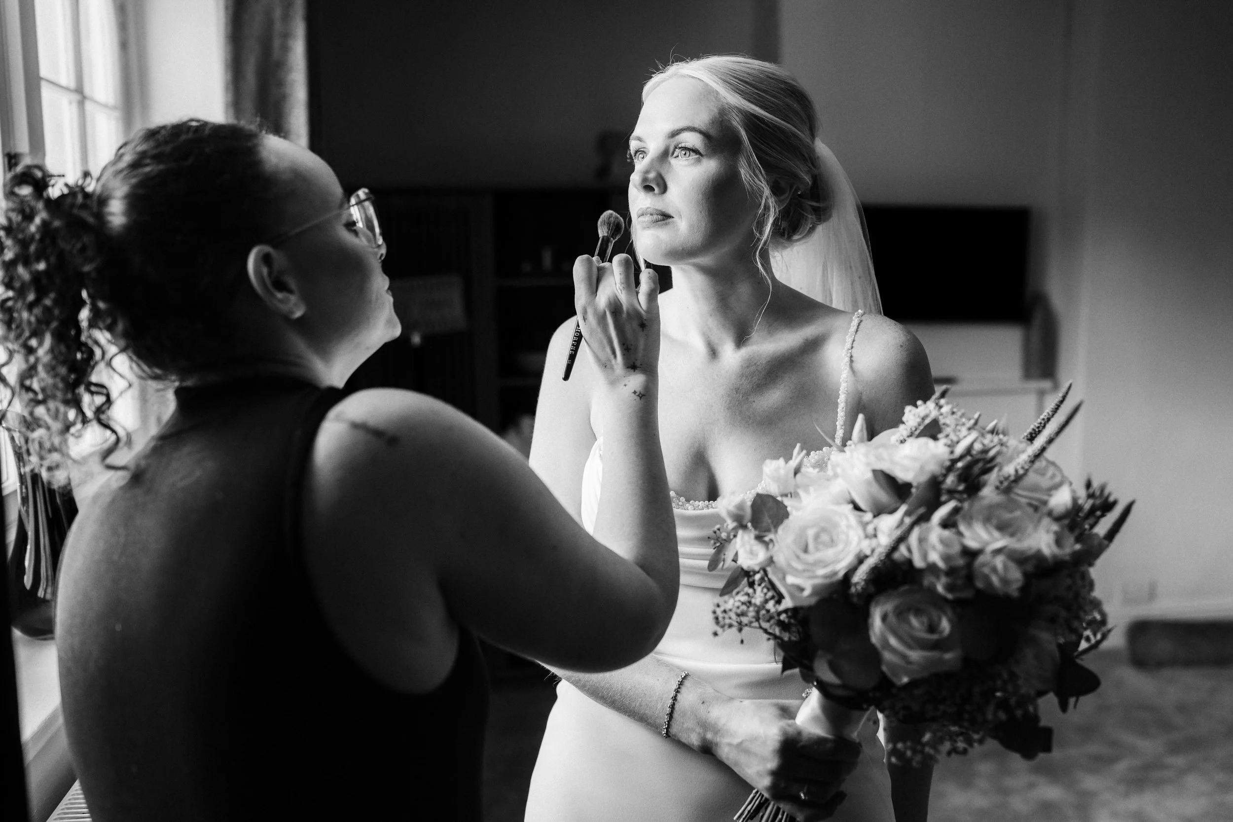WOODBOROUGH HALL WEDDING PHOTOGRAPHER - bride having her make-up done on the morning of her wedding