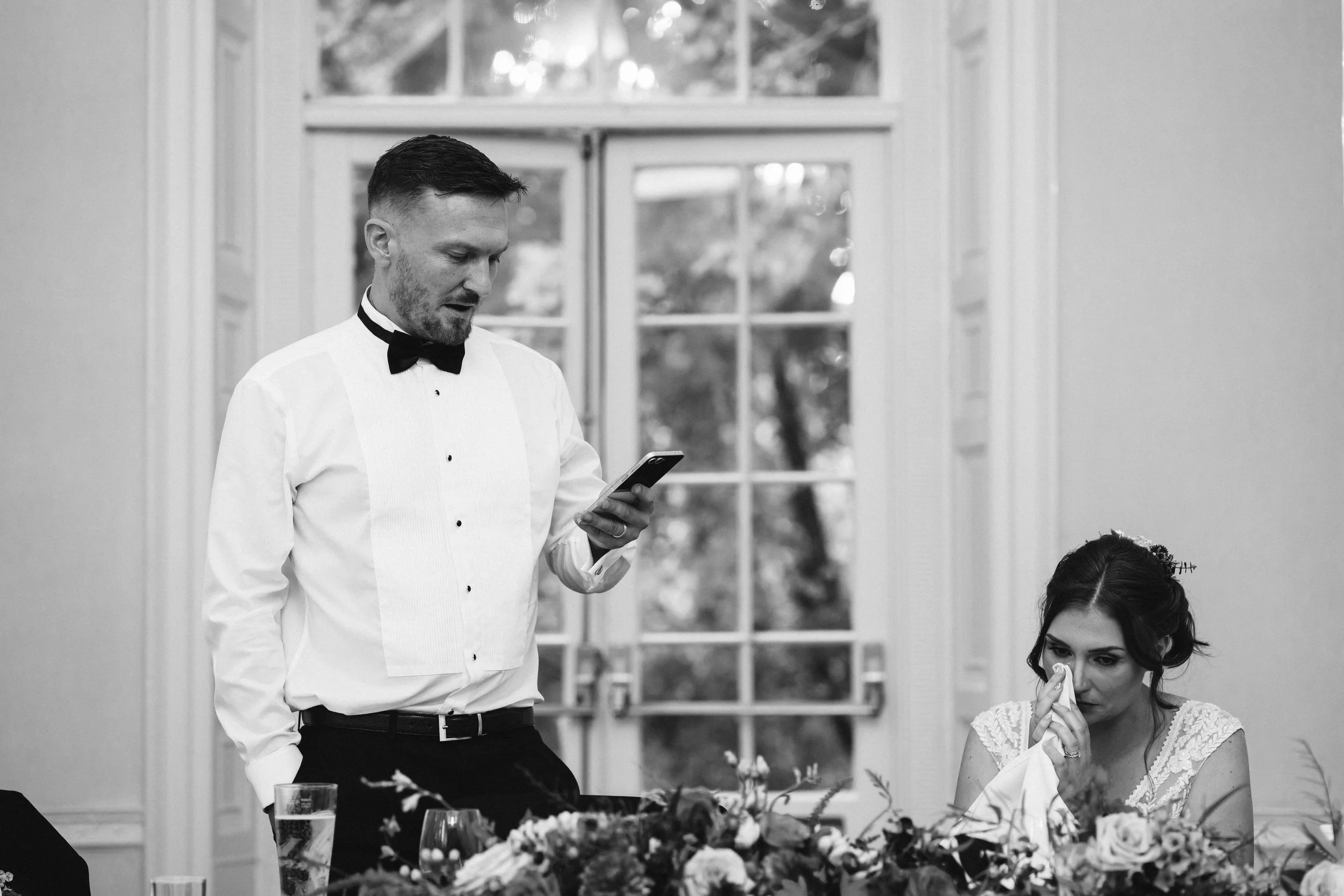 The bride getting emotional during the grooms speech at Colwick Hall