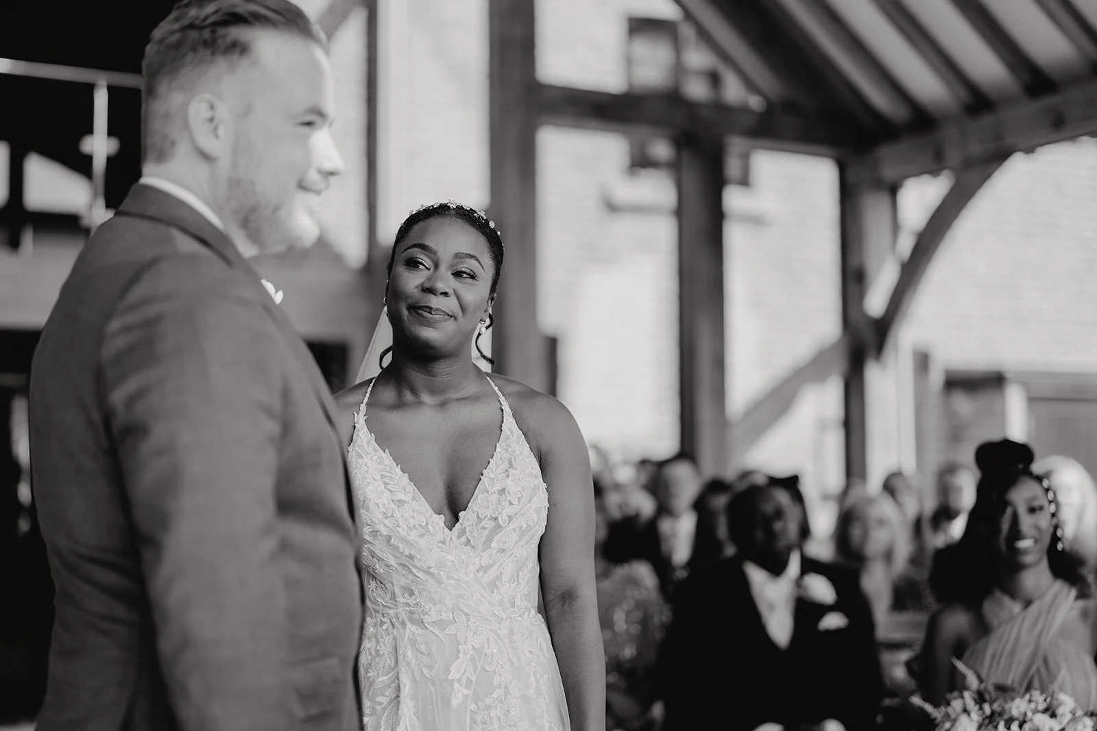Swancar Farm Wedding Venue Guide - bride looking at the groom during the wedding ceremont at Swancar Farm