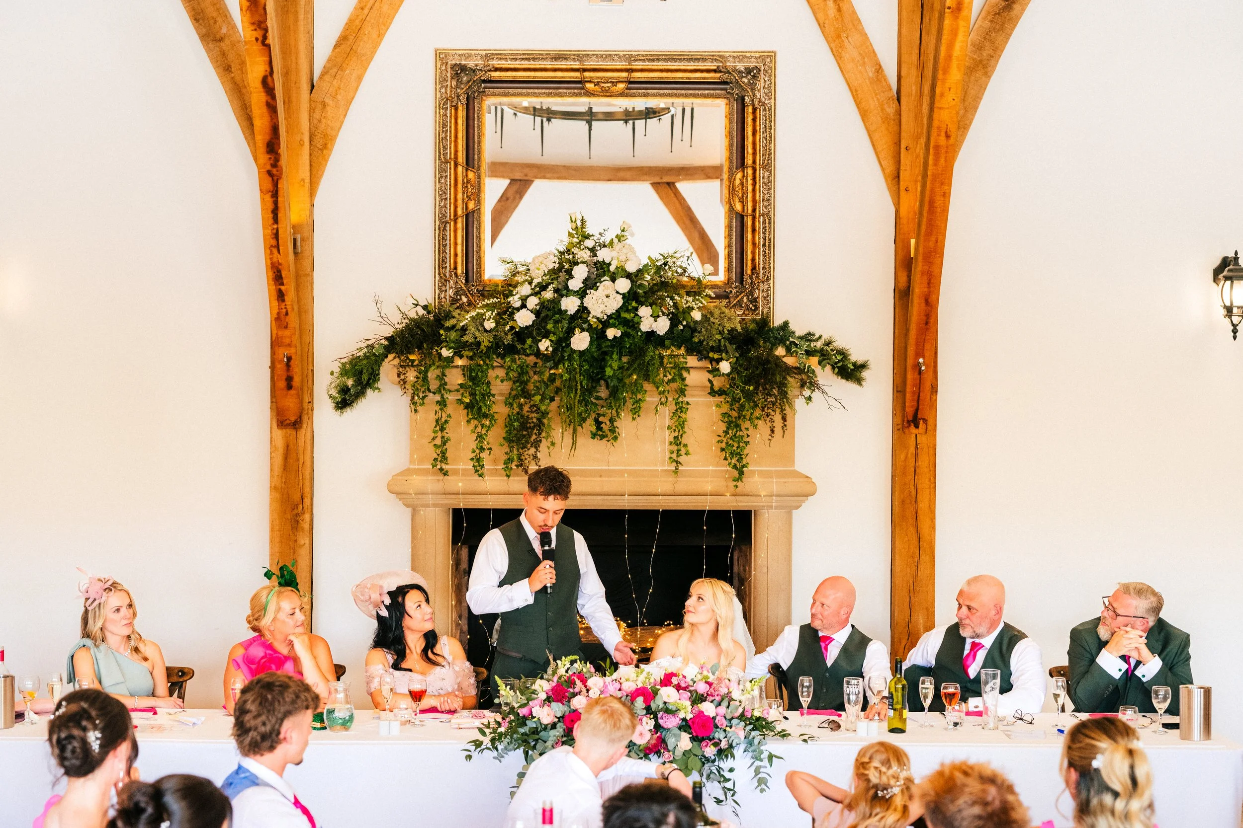 SWANCAR FARM WEDDING PHOTOGRAPHY - groom toasting the bride during the wedding speeches