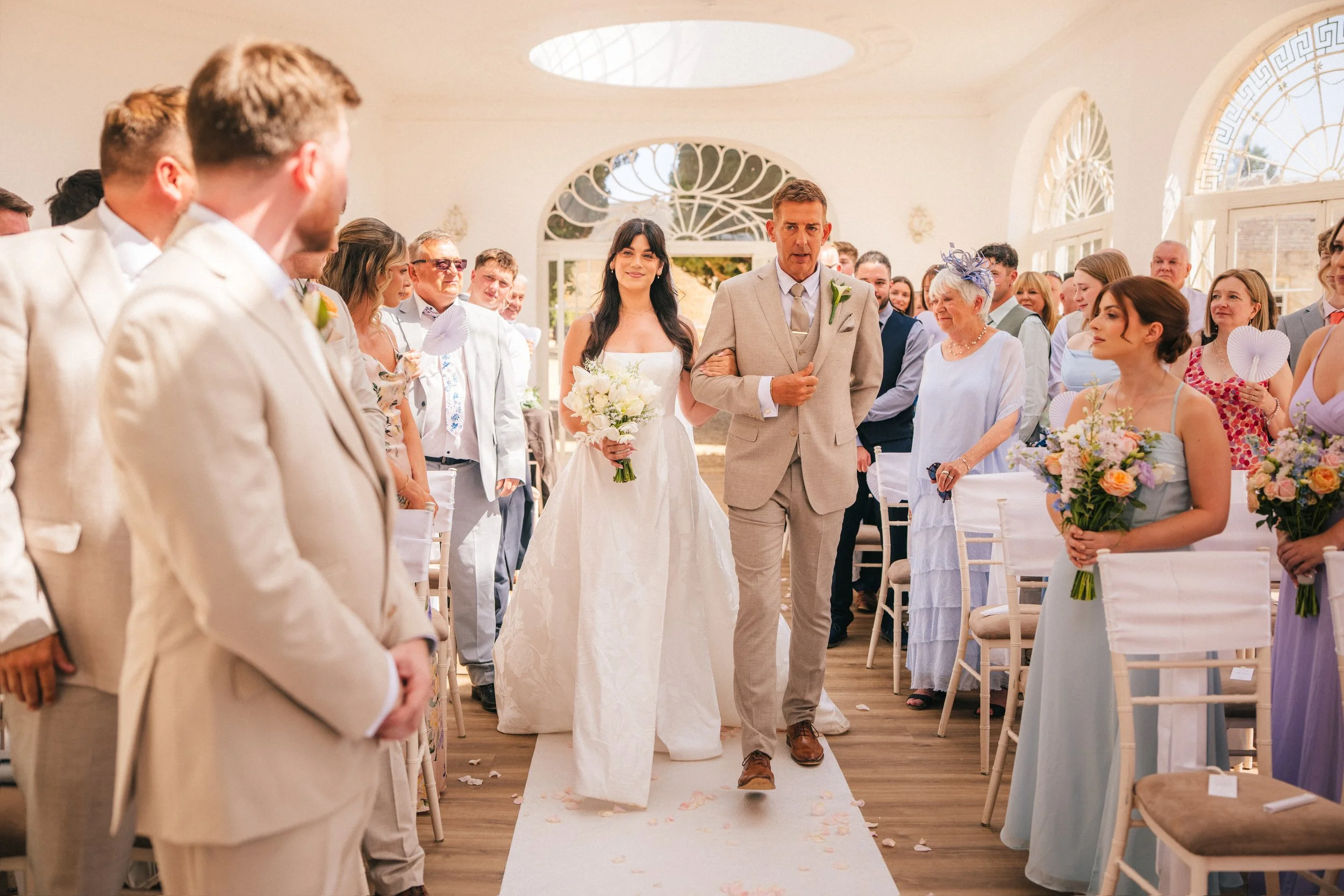 BARTON HALL WEDDING PHOTOGRAPHY - bride and the father of the bride walking down the aisle at Barton Hall