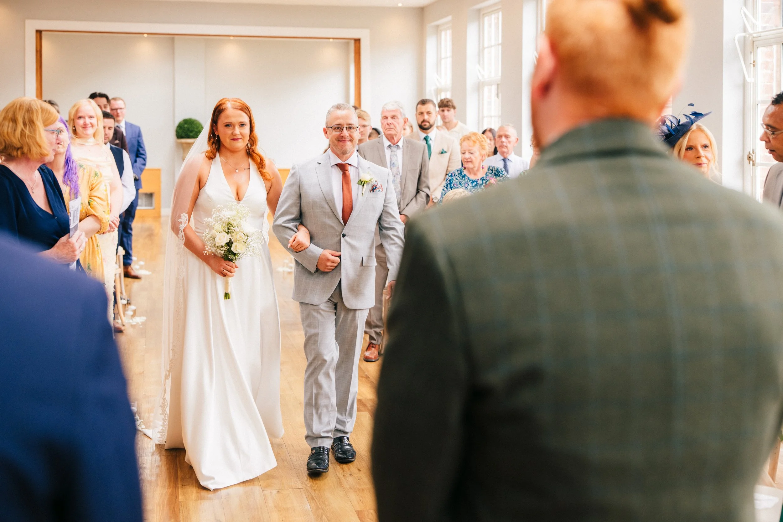 BREDENBURY COURT BARNS WEDDING PHOTOGRAPHER - Bride and her Dad walking down the aisle at Bredenbury Court Barns