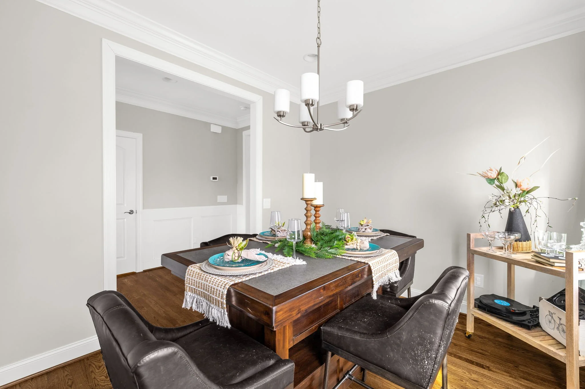 Formal dining room open to the foyer at 8012 NW Meadows Drive, Stokesdale, NC 27357. Listed by Delia Knight, REALTOR® with Howard Hanna Allen Tate Real Estate.