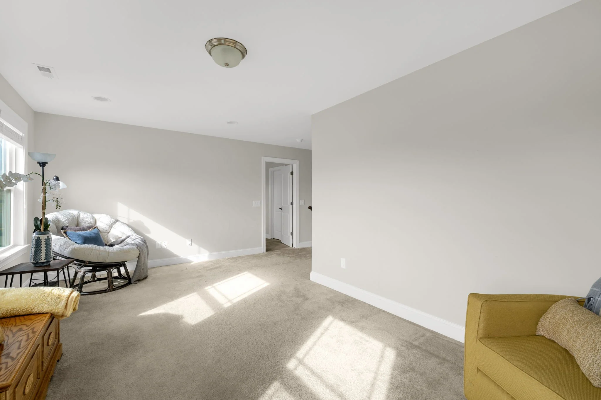 Bonus room alternate view at 8012 NW Meadows Drive, Stokesdale, NC 27357. Listed by Delia Knight, REALTOR® with Howard Hanna Allen Tate Real Estate.