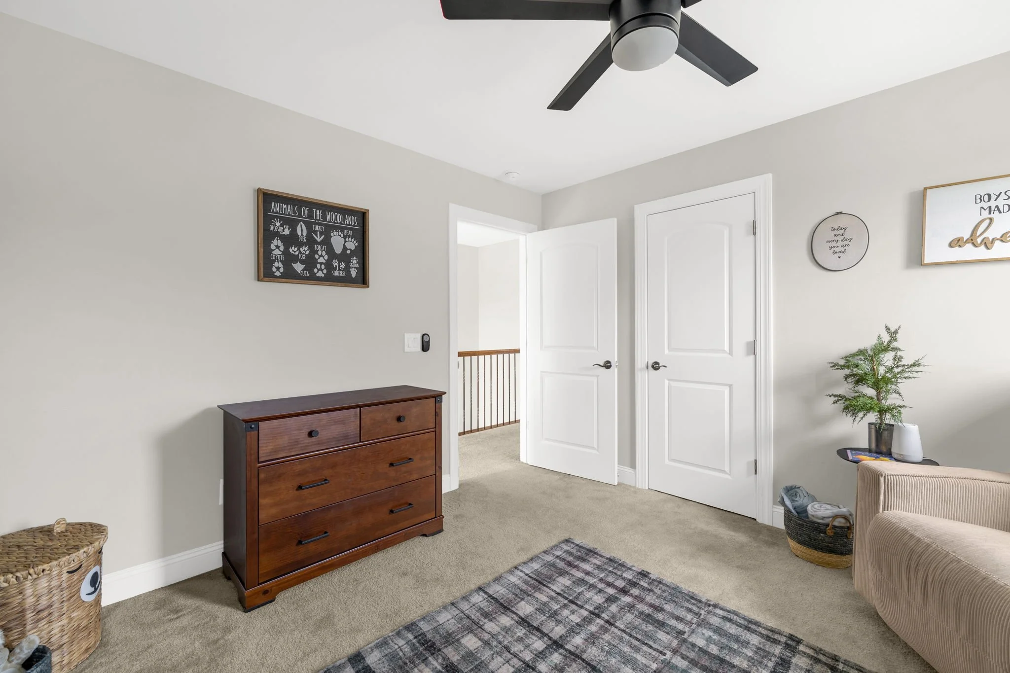 Bedroom two with closet and hallway view at 8012 NW Meadows Drive, Stokesdale, NC 27357. Listed by Delia Knight, REALTOR® with Howard Hanna Allen Tate Real Estate.