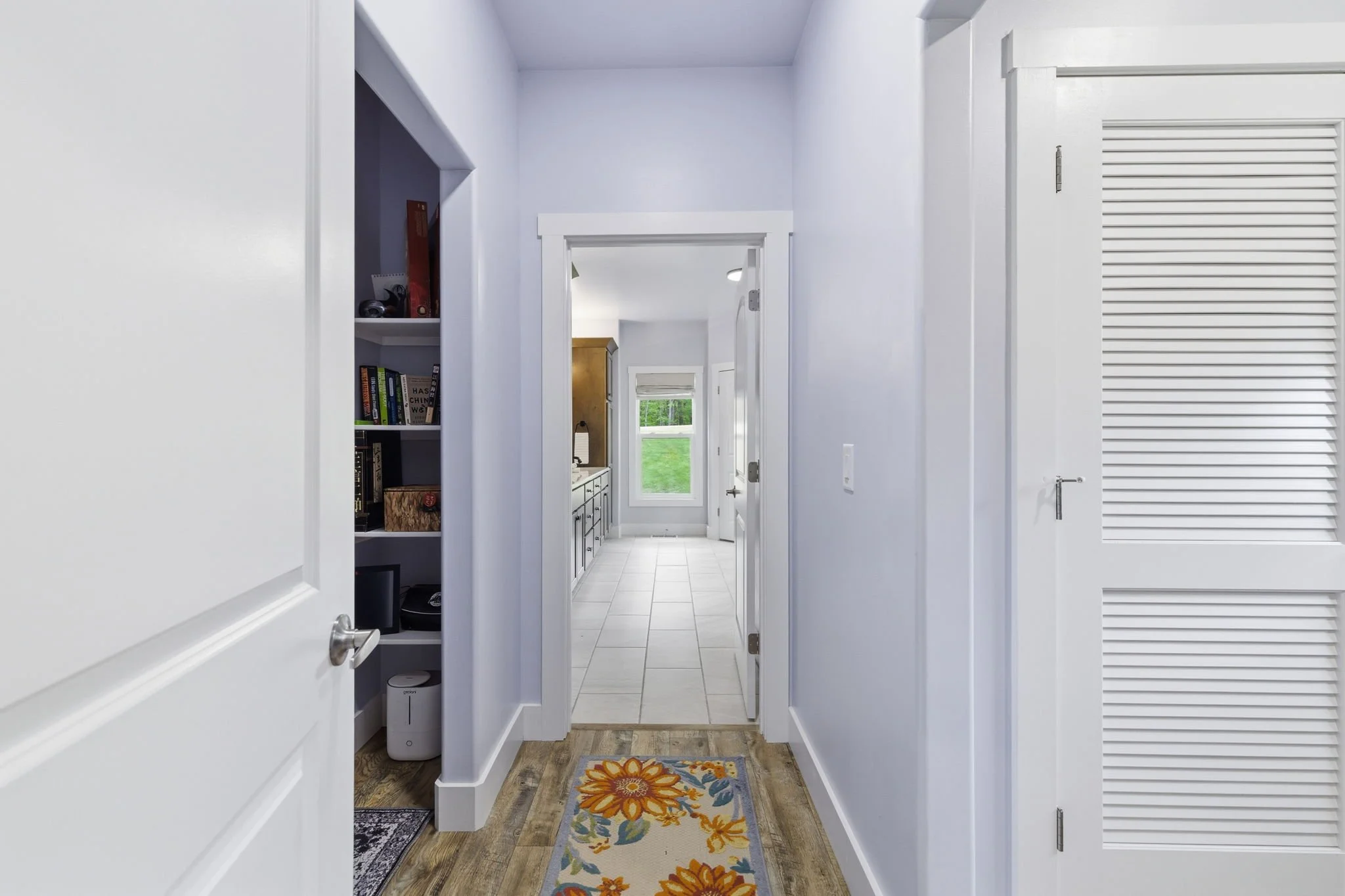 27-delia-knight-7351-hidden-view-dr-primary-suite-hallway-oak-ridge-nc-27310.jpg