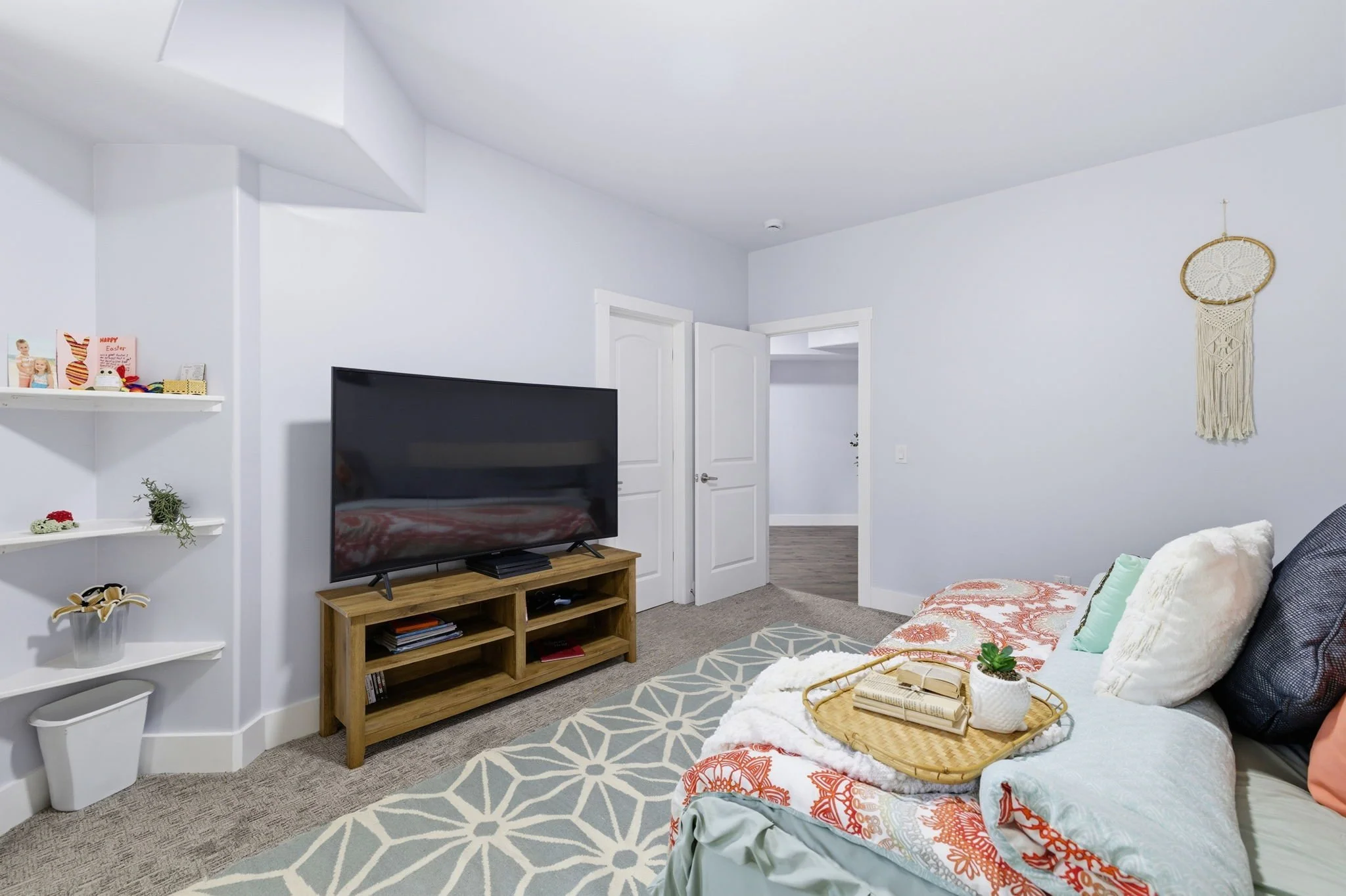 53-delia-knight-7351-hidden-view-dr-lower-level-bedroom-tv-area-oak-ridge-nc-27310.jpg
