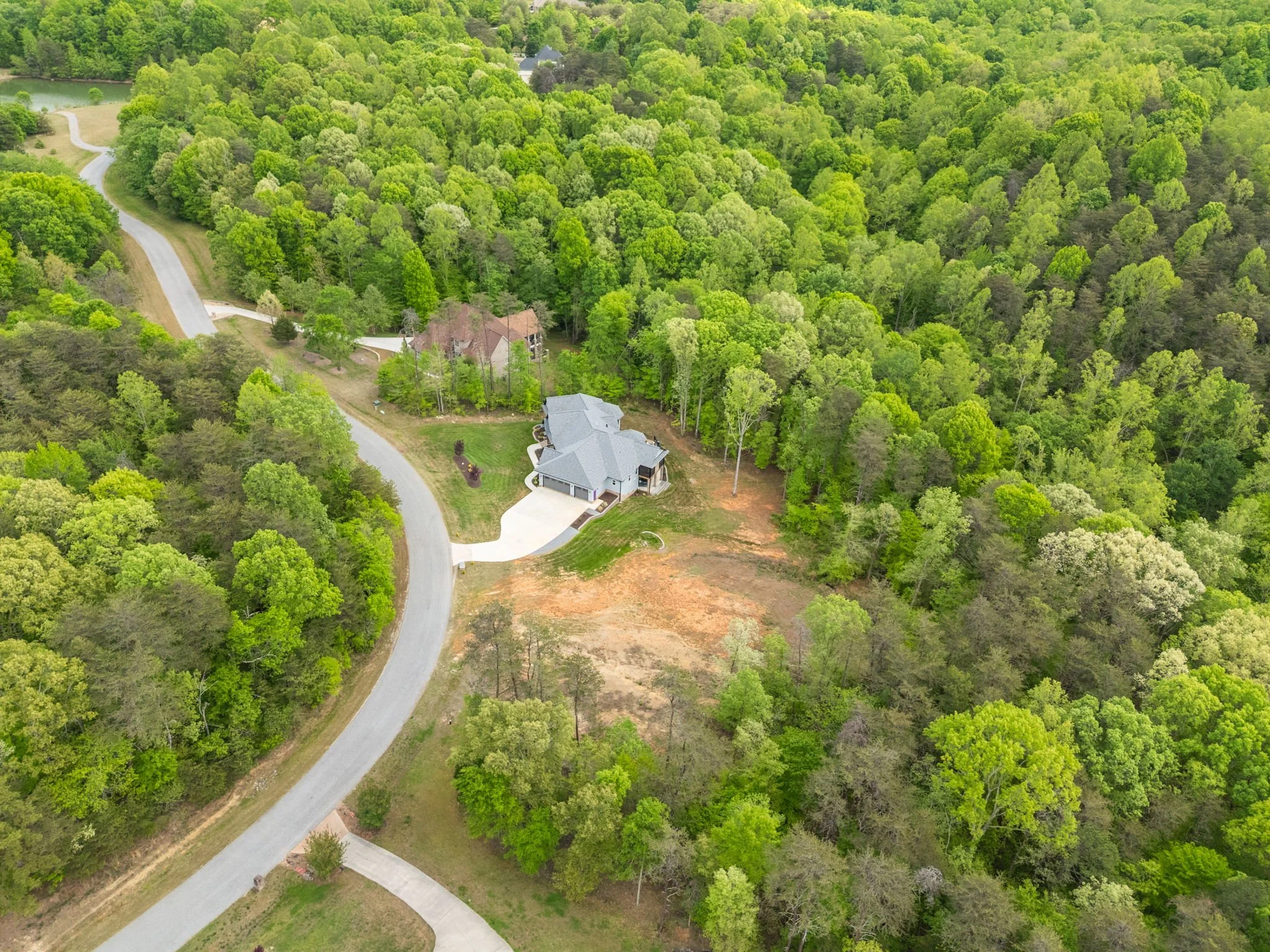 70-delia-knight-7351-hidden-view-dr-aerial-driveway-view-oak-ridge-nc-27310.jpg