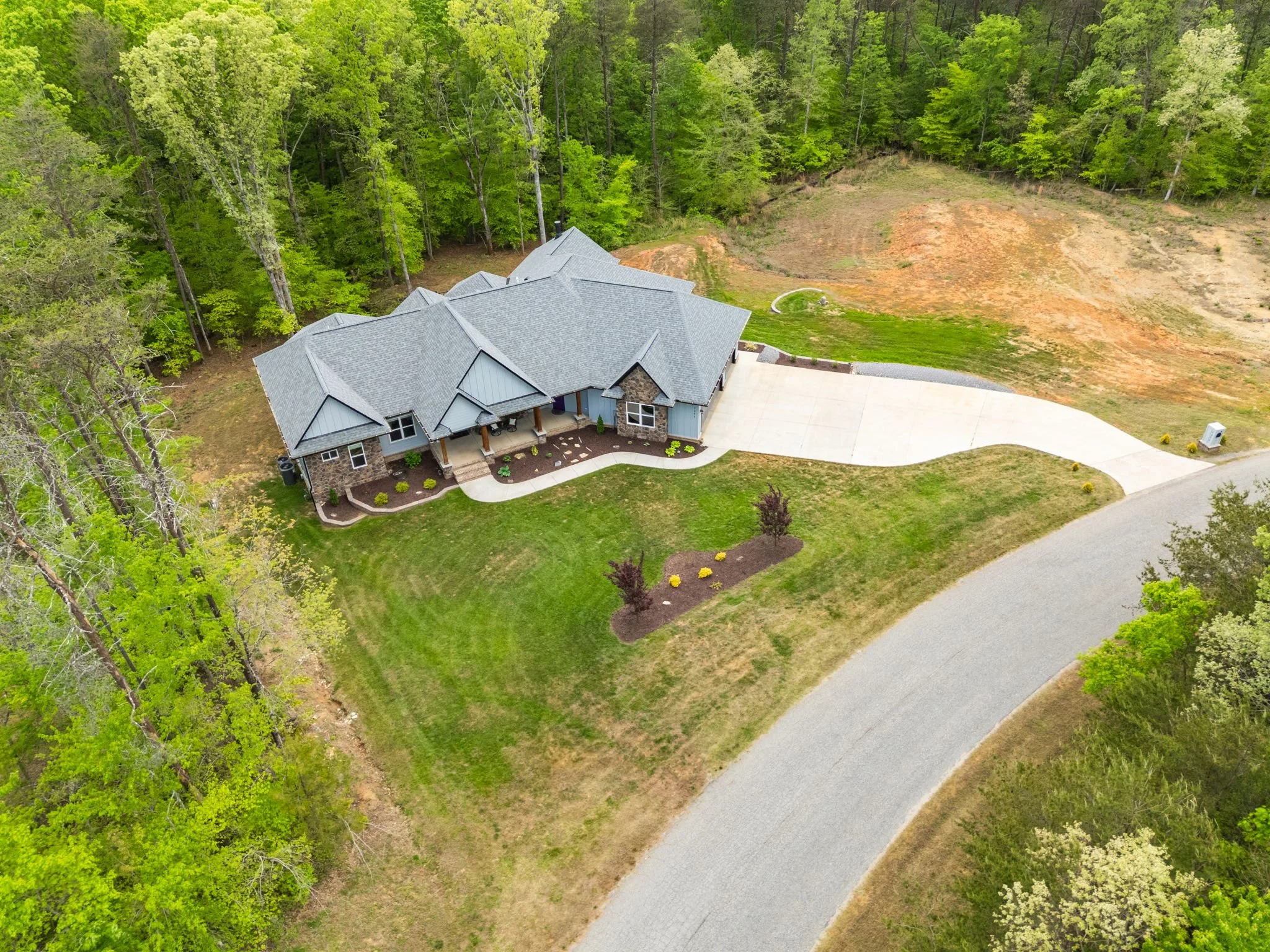 73-delia-knight-7351-hidden-view-dr-aerial-front-neighbors-oak-ridge-nc-27310.jpg