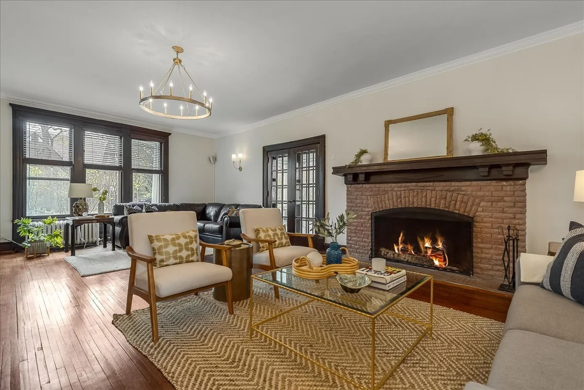 Living room with fireplace in Montrose section South Orange home