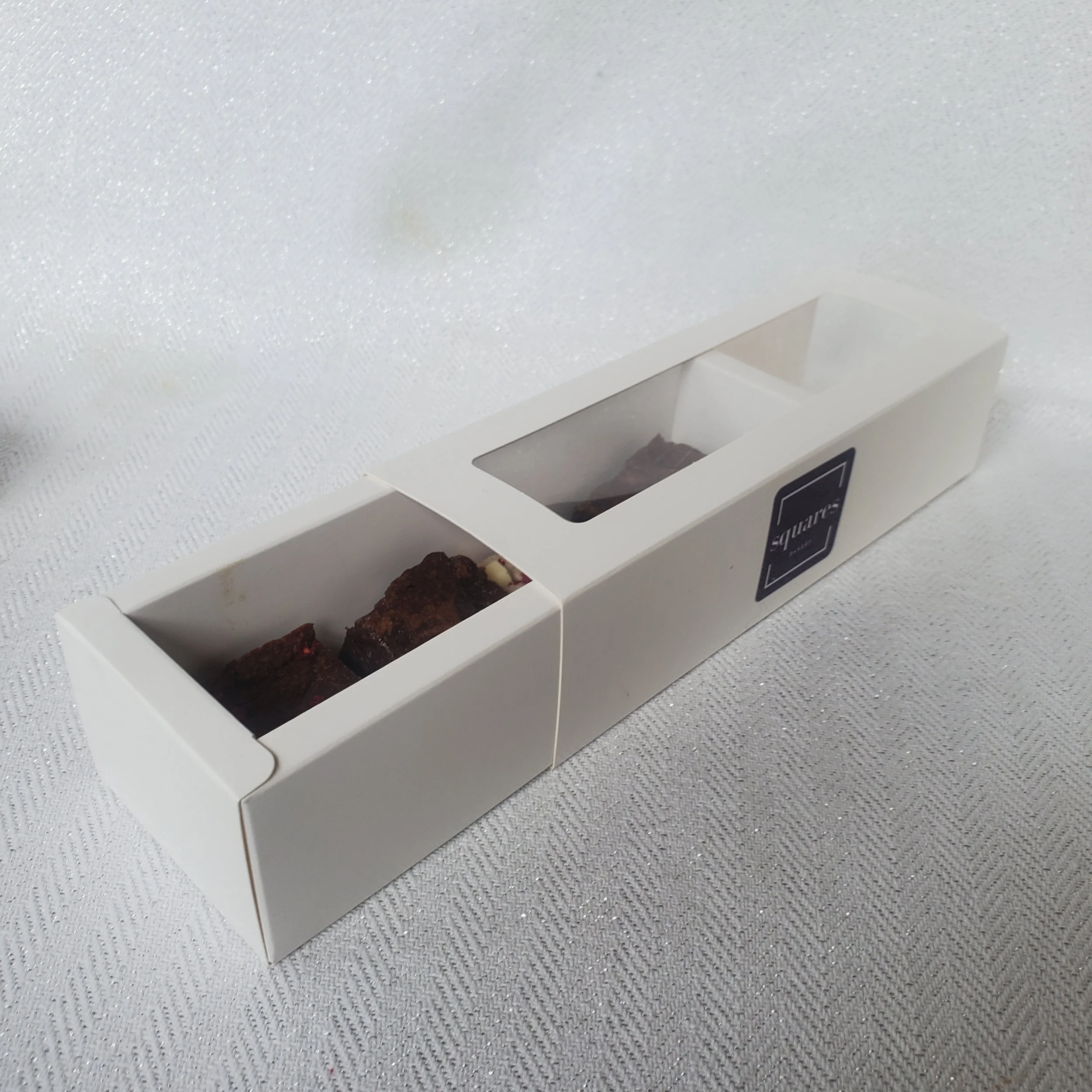 sliding open a brownie bite box