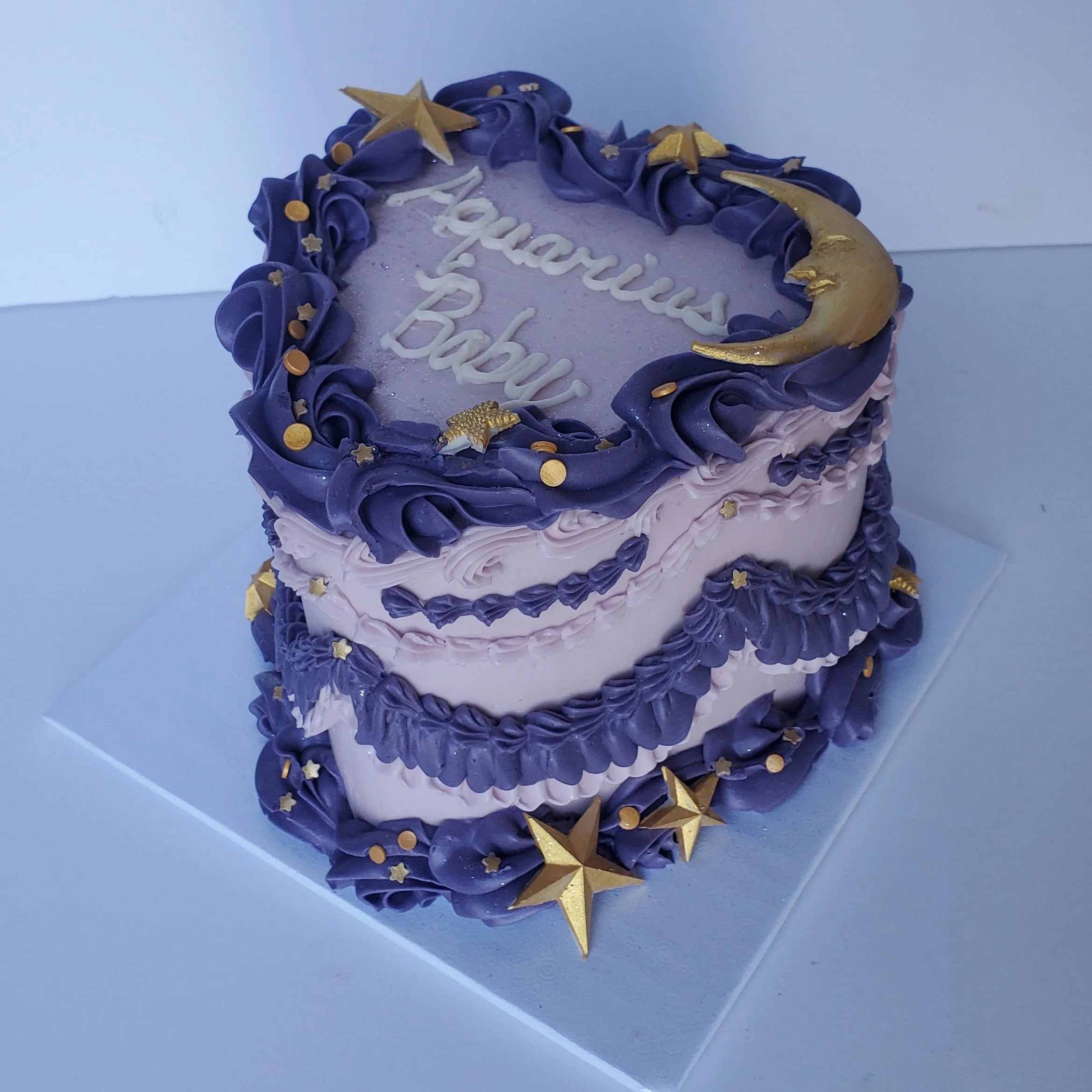 purple vintage heart cake for an aquarius birthday 