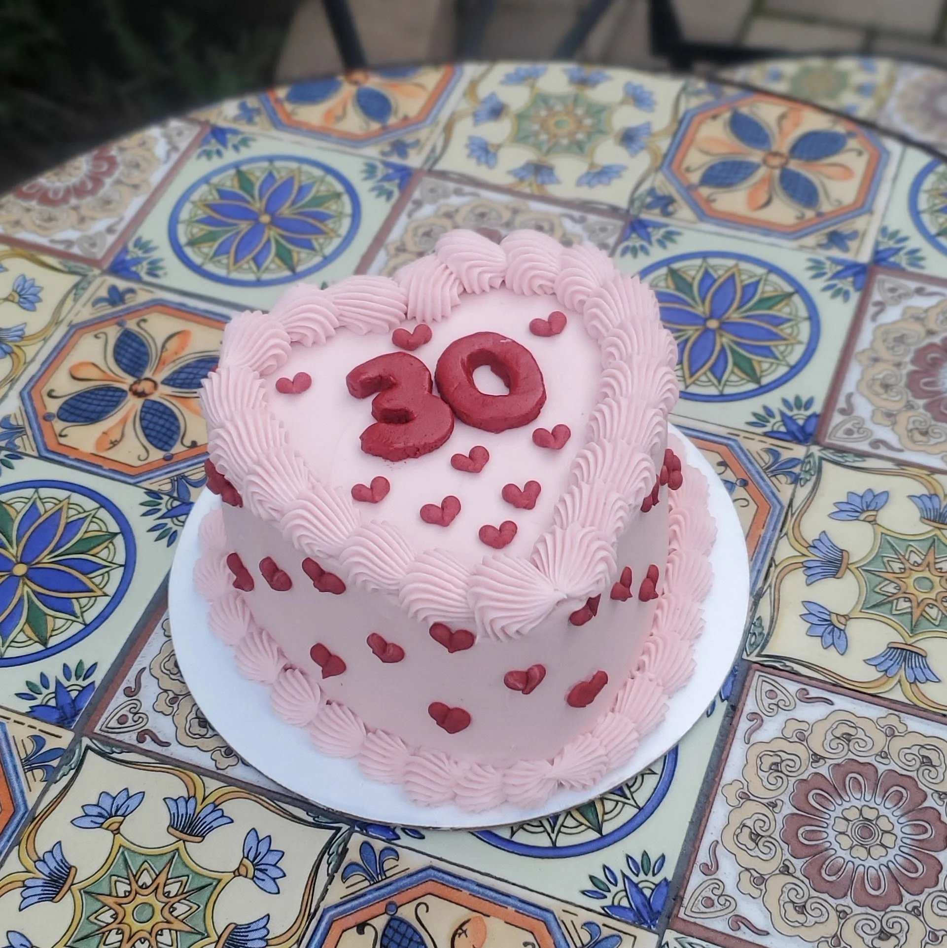 pink vintage heart cake with little red hearts
