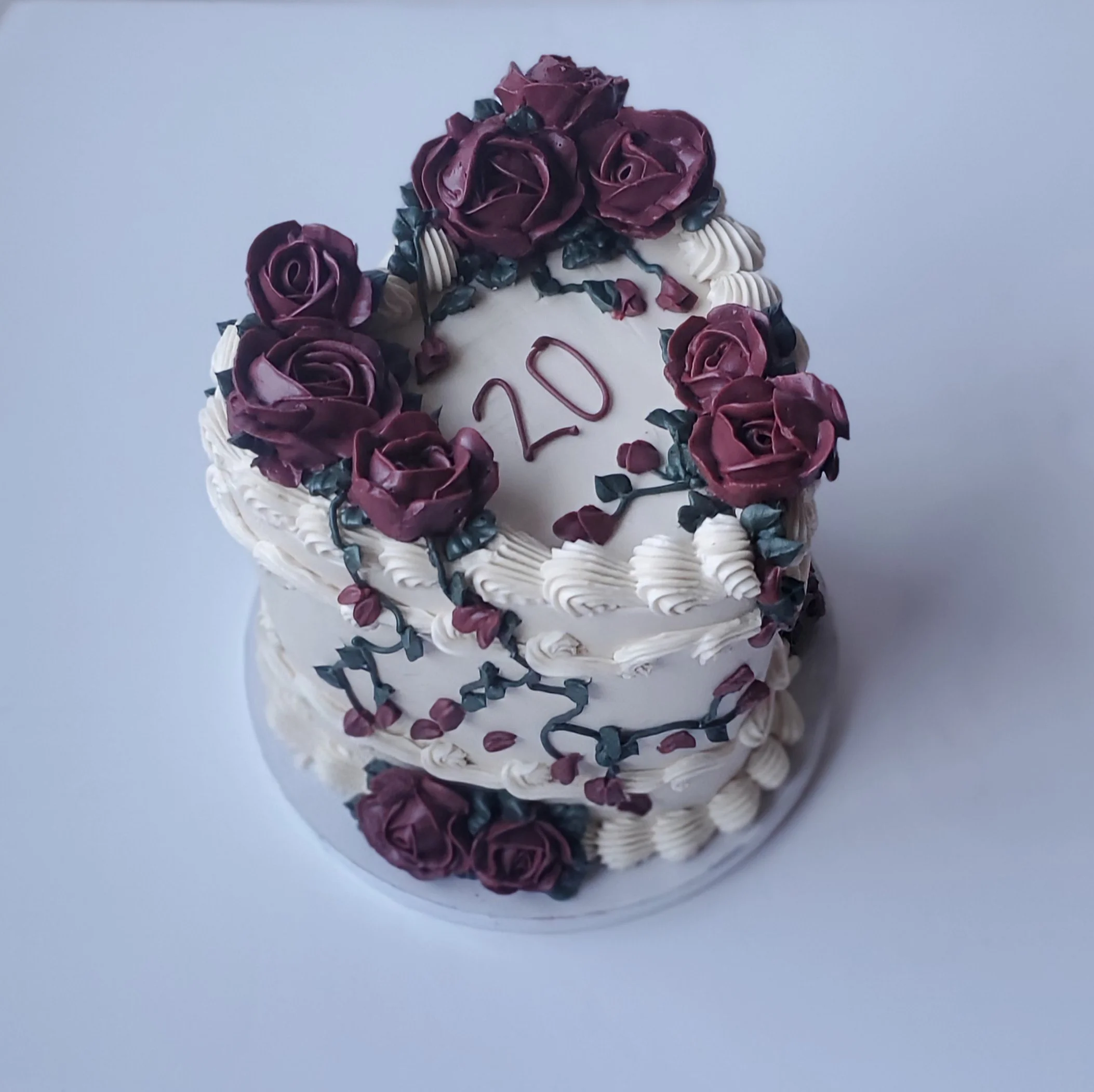 white vintage heart cake with burgundy roses